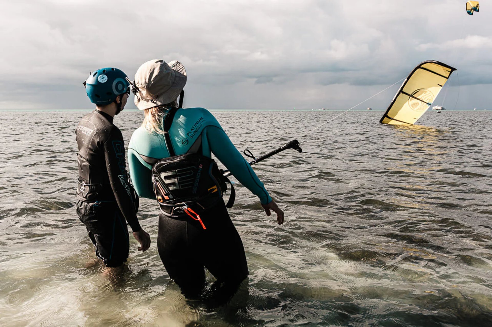 an abstract photo of a curved building with a blue sky in the background