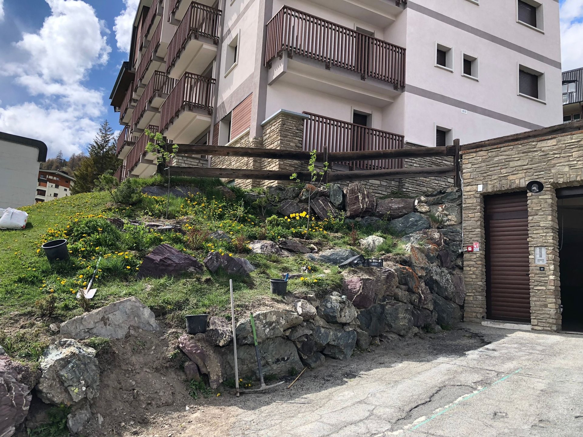 an abstract photo of a curved building with a blue sky in the background