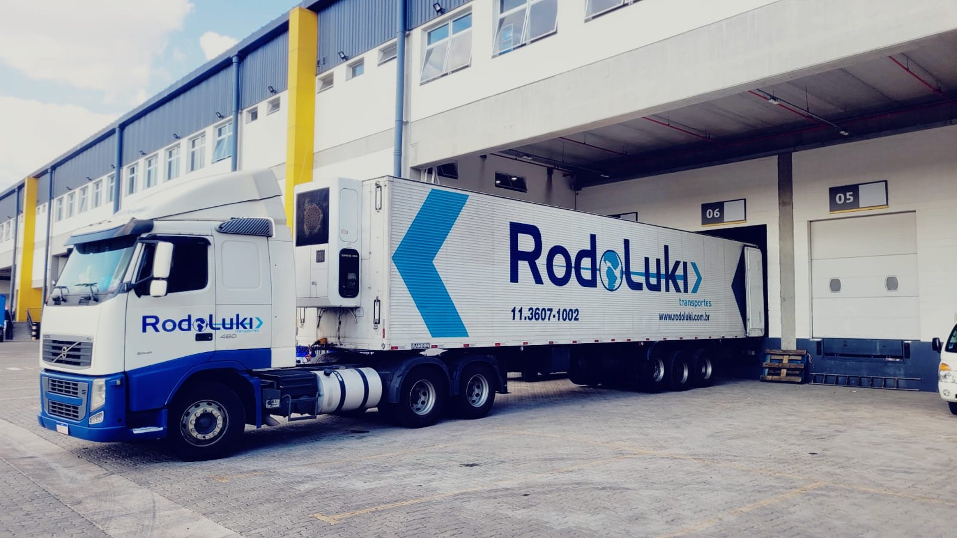 woman wearing yellow long-sleeved dress under white clouds and blue sky during daytime