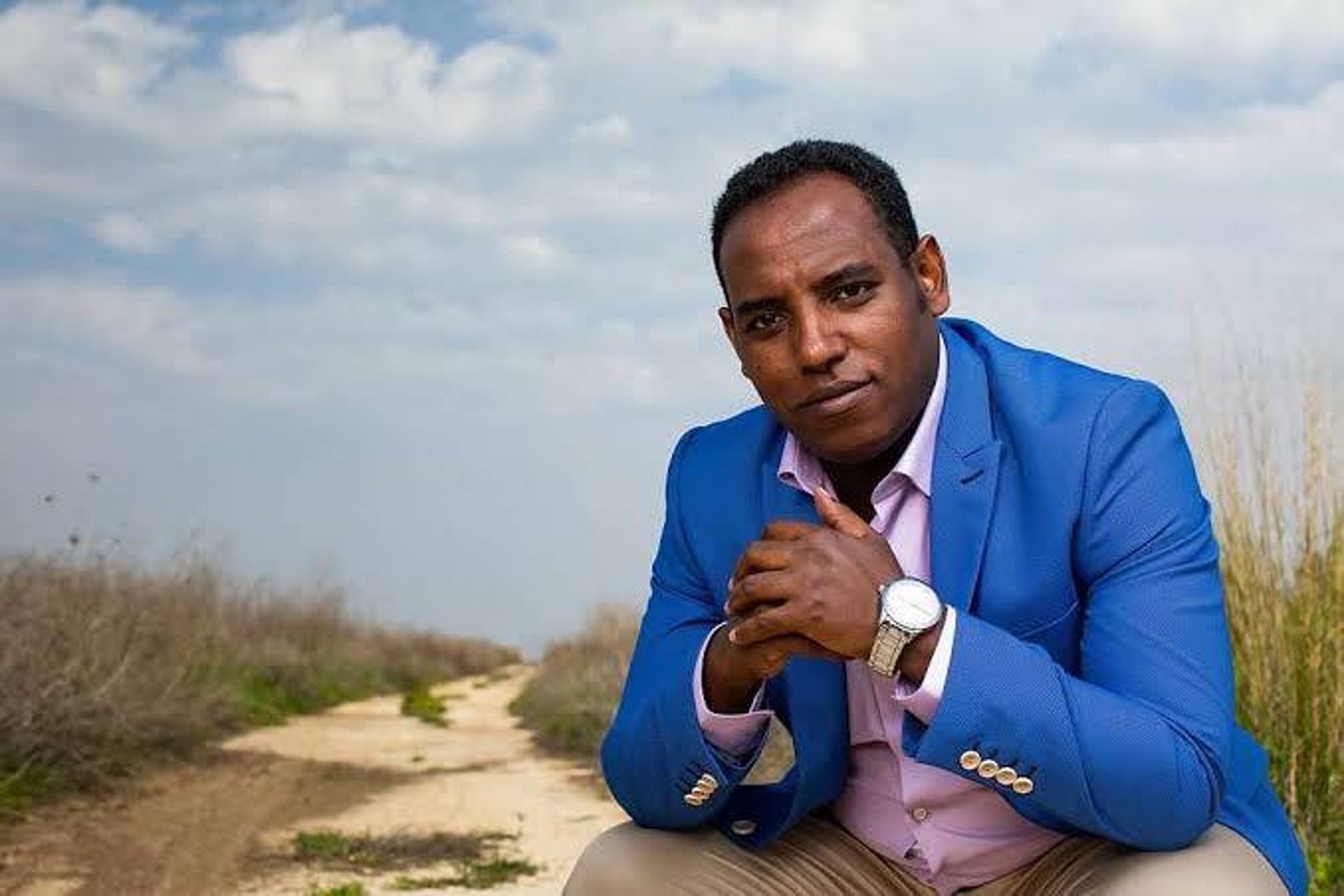 black and brown leather padded tub sofa