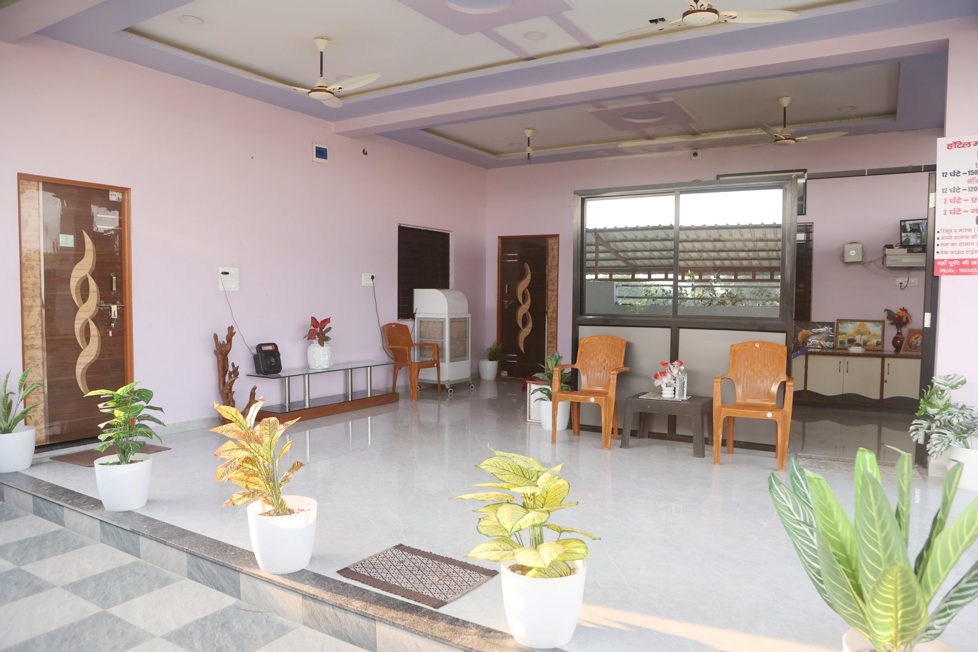 black and white bed near brown wooden table