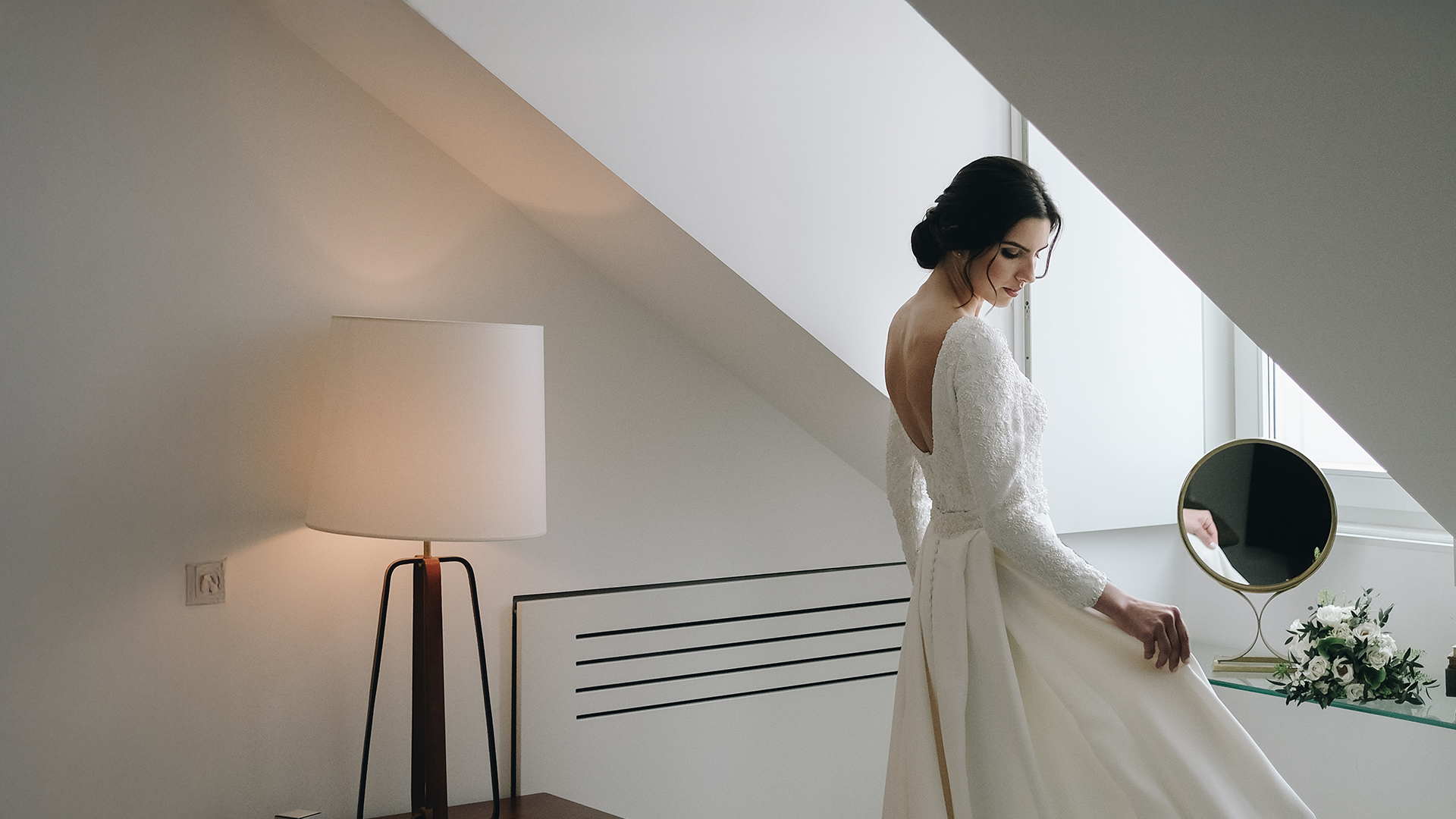 an abstract photo of a curved building with a blue sky in the background