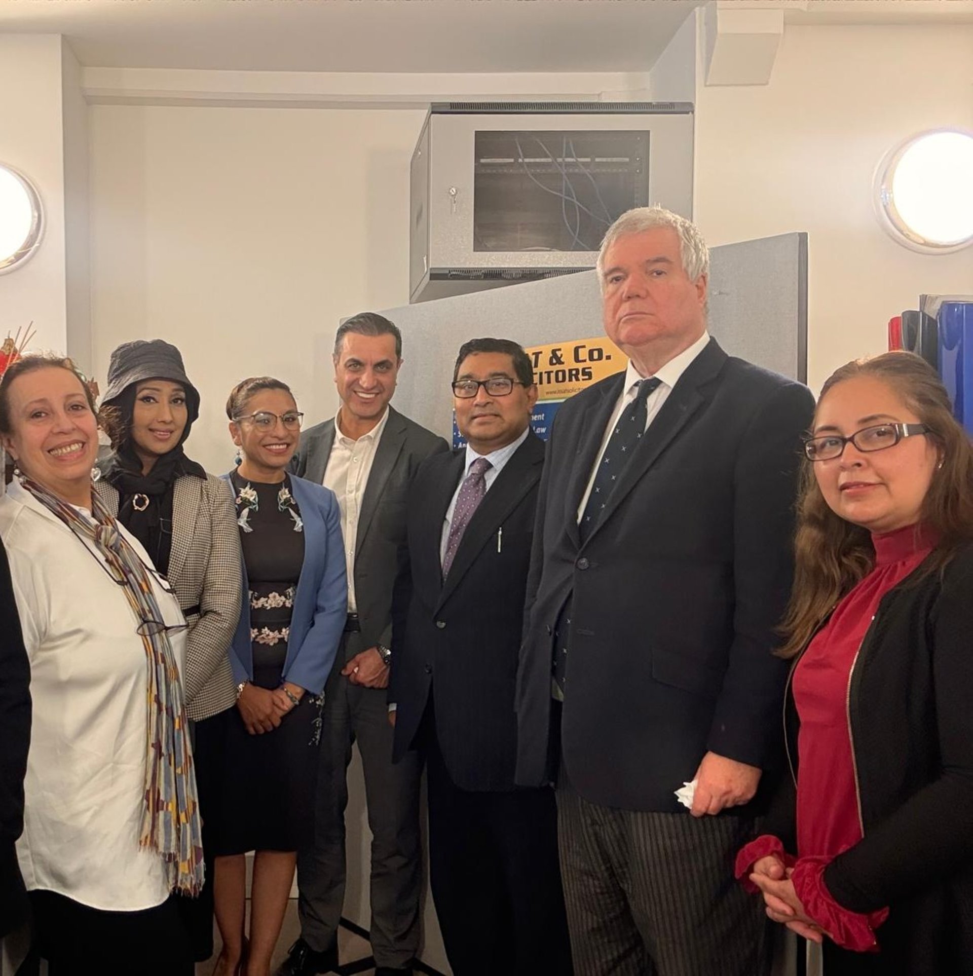 woman wearing yellow long-sleeved dress under white clouds and blue sky during daytime