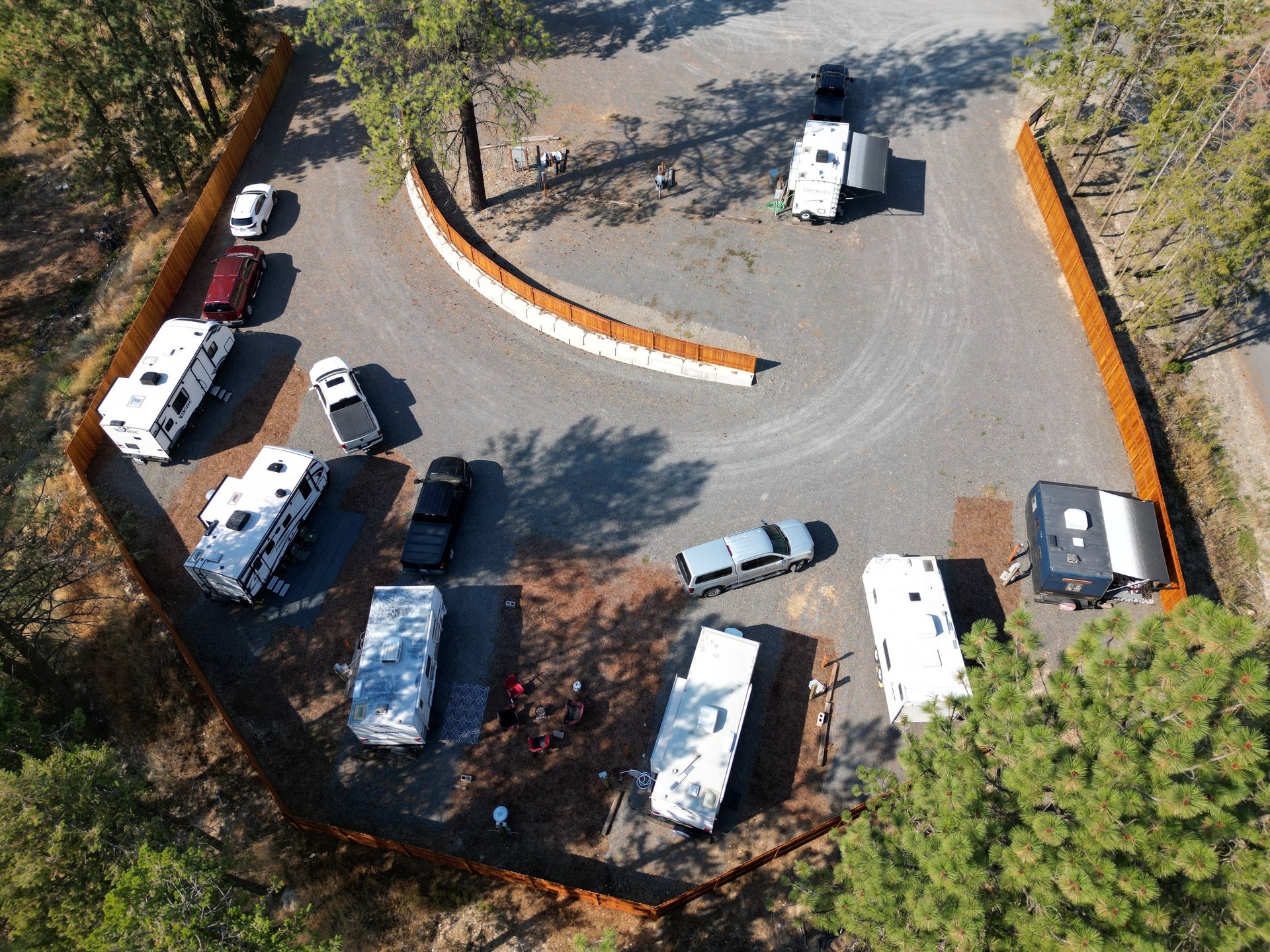 brown horse drinking water from stainless steel bucket