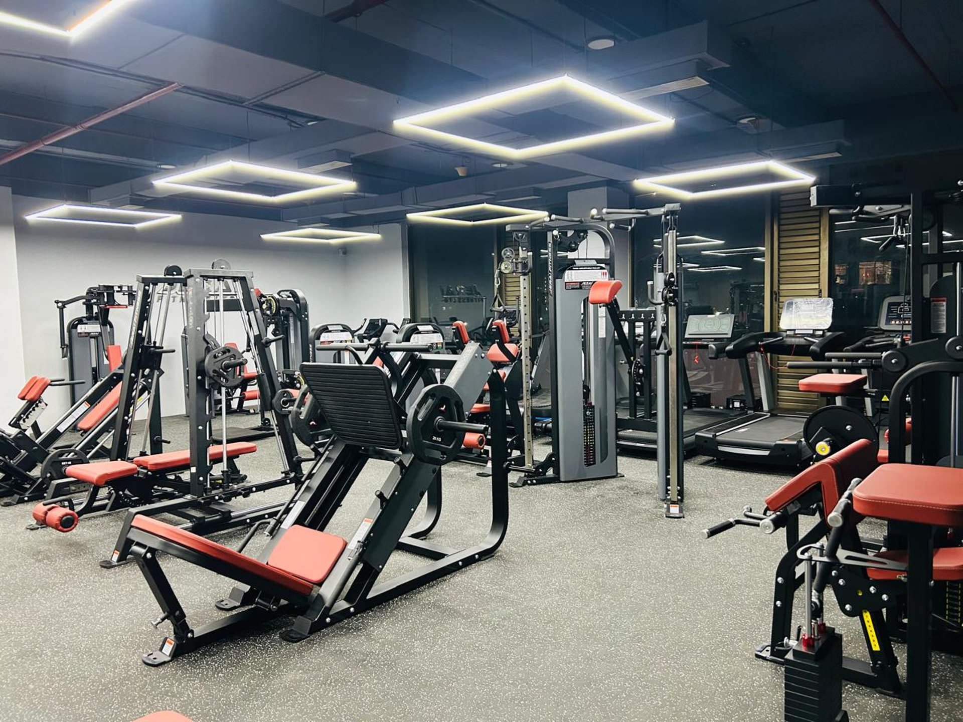 an abstract photo of a curved building with a blue sky in the background