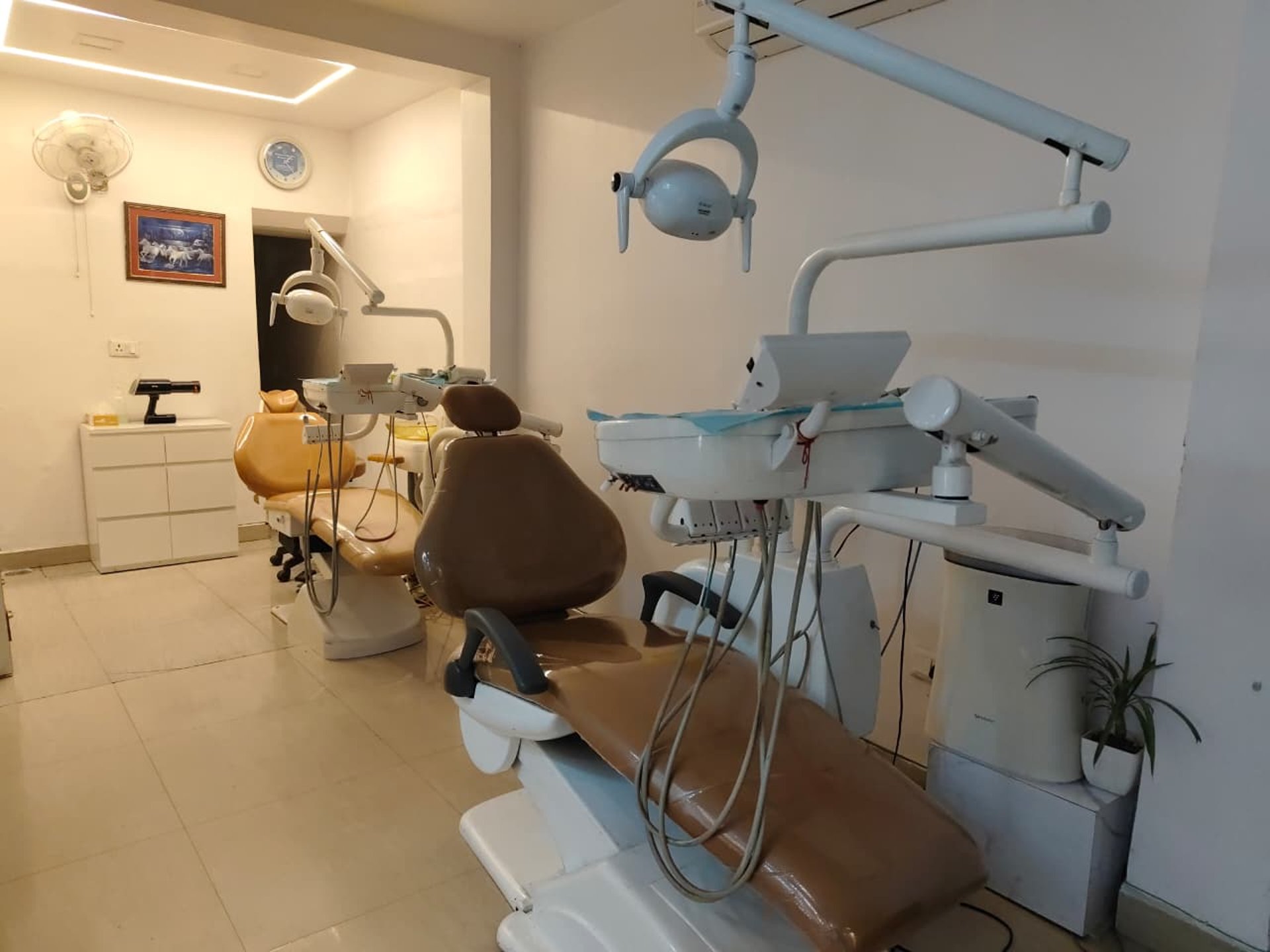 black and brown leather padded tub sofa
