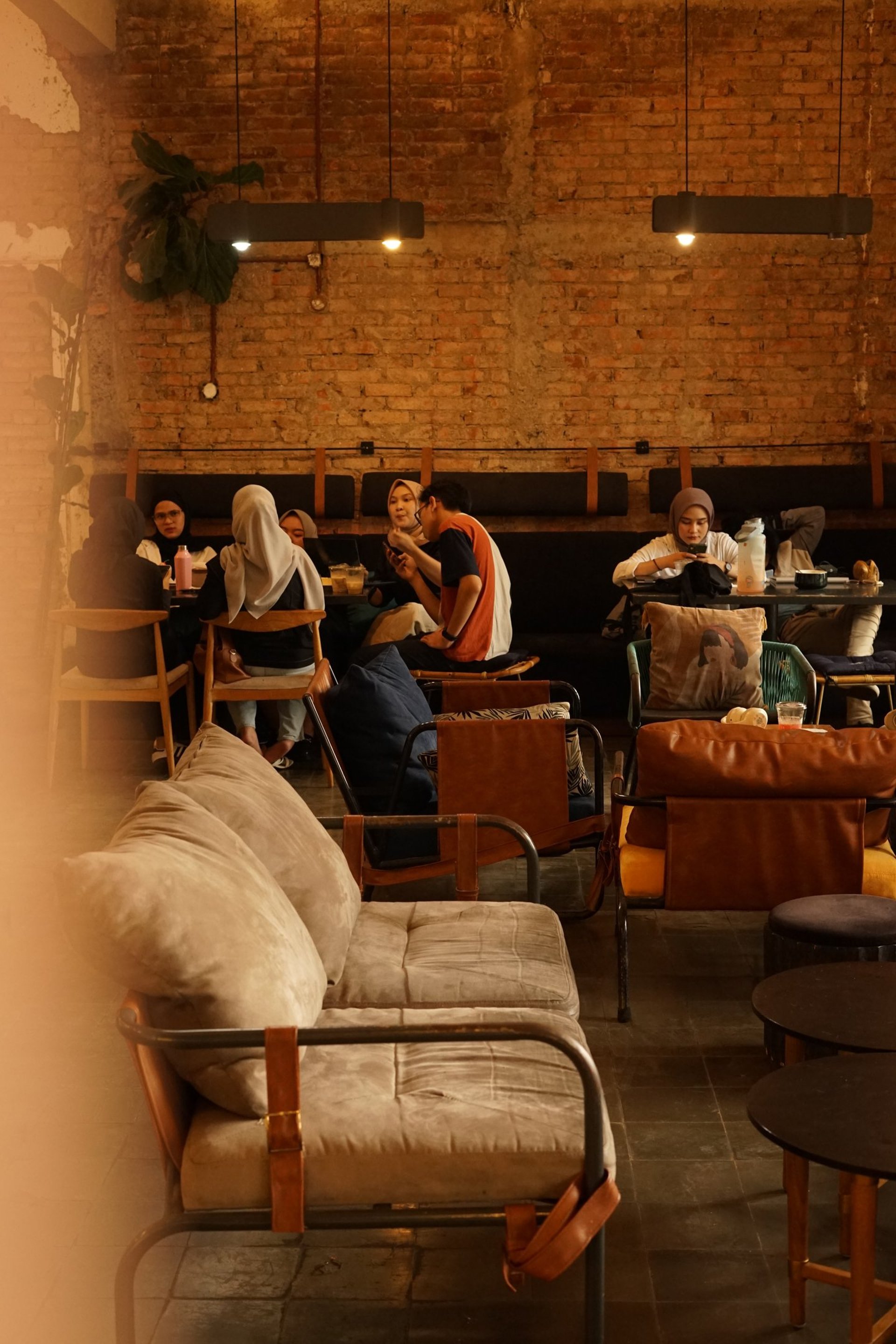 an abstract photo of a curved building with a blue sky in the background