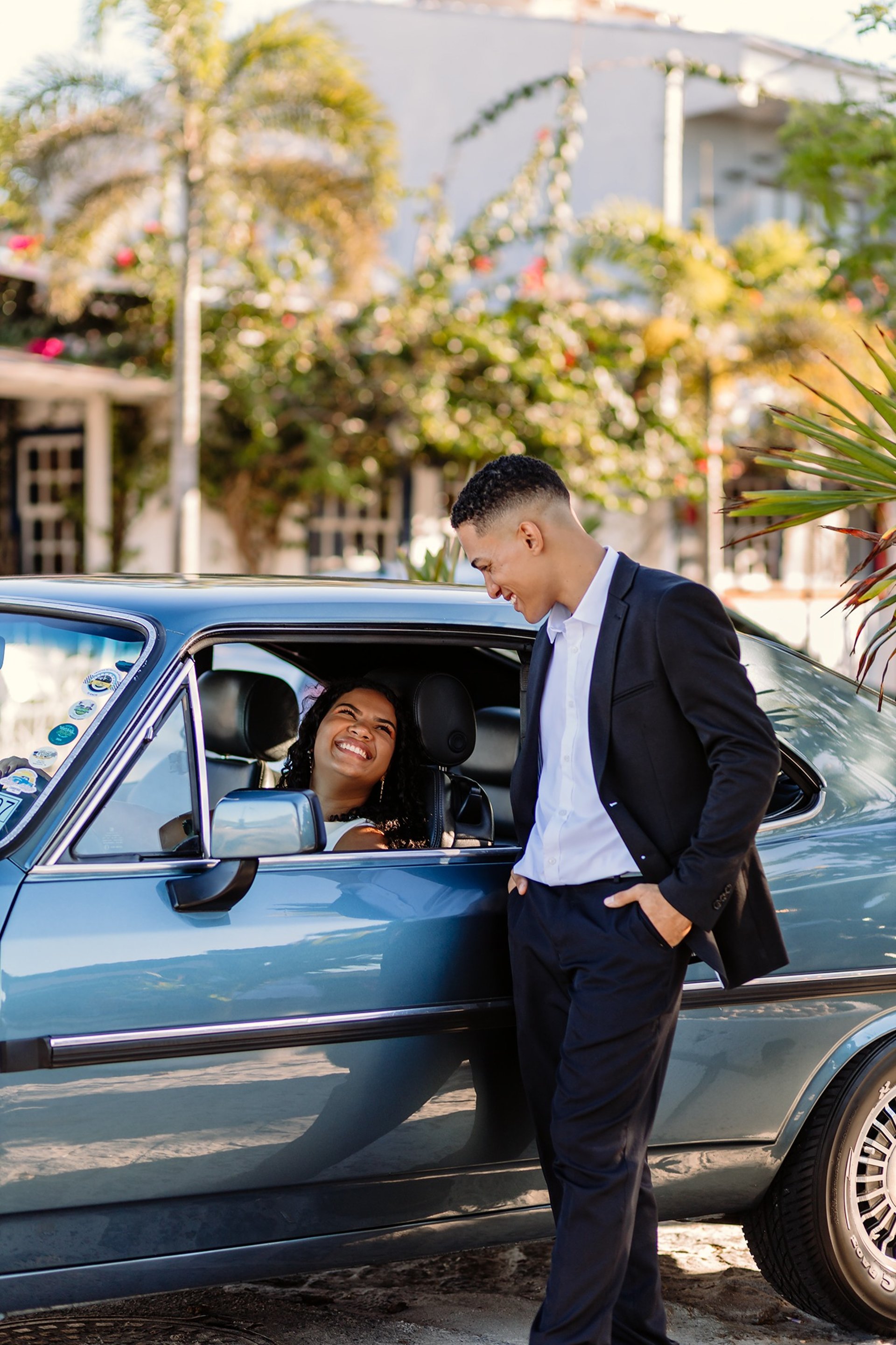 an abstract photo of a curved building with a blue sky in the background