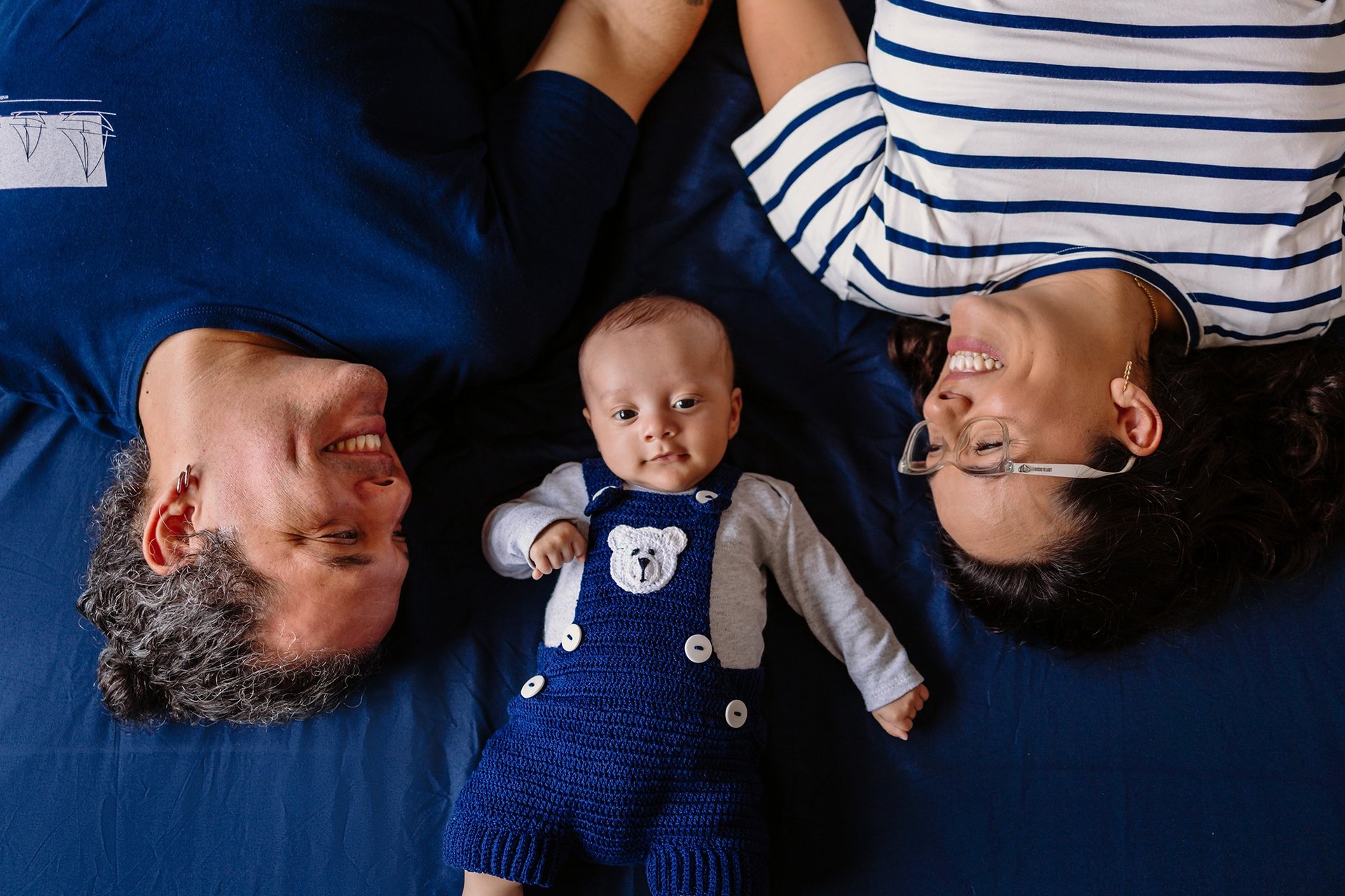 an abstract photo of a curved building with a blue sky in the background
