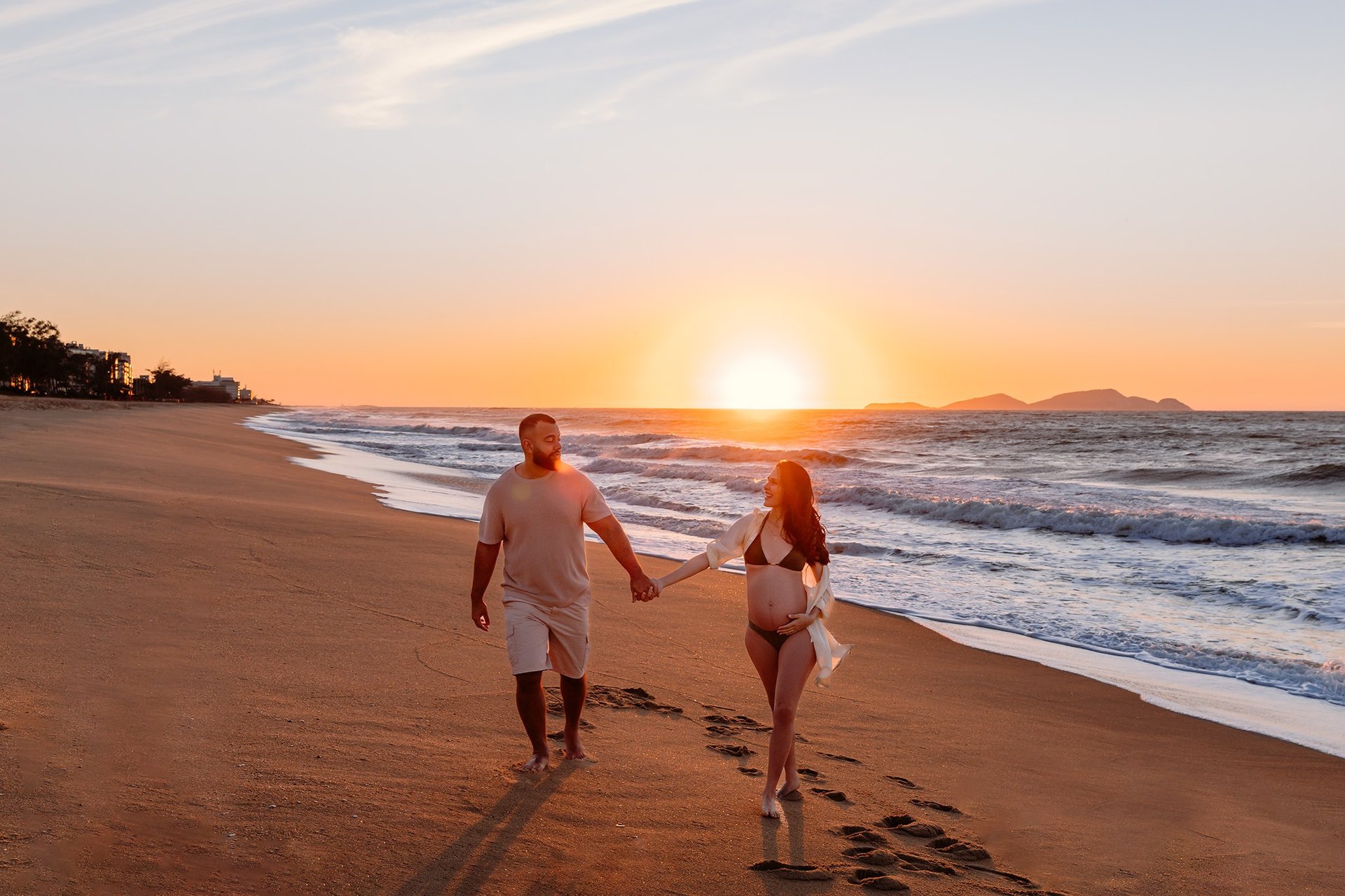 an abstract photo of a curved building with a blue sky in the background