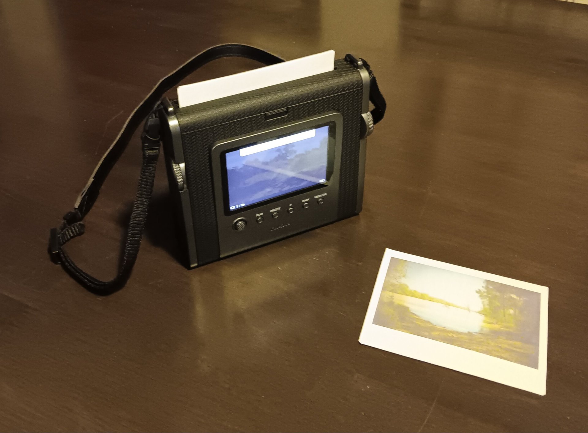 a baby laying on top of a bed next to blocks