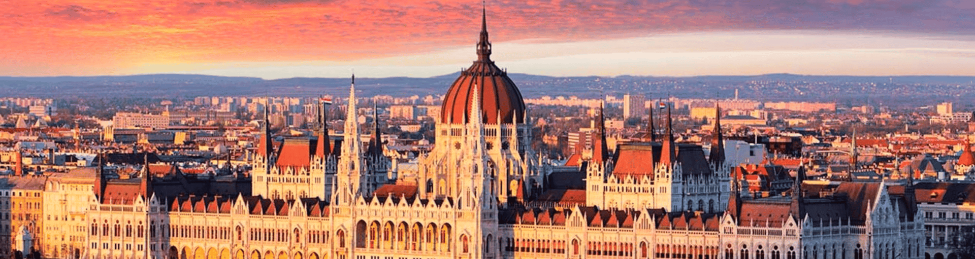 white and brown concrete building under blue sky during daytime