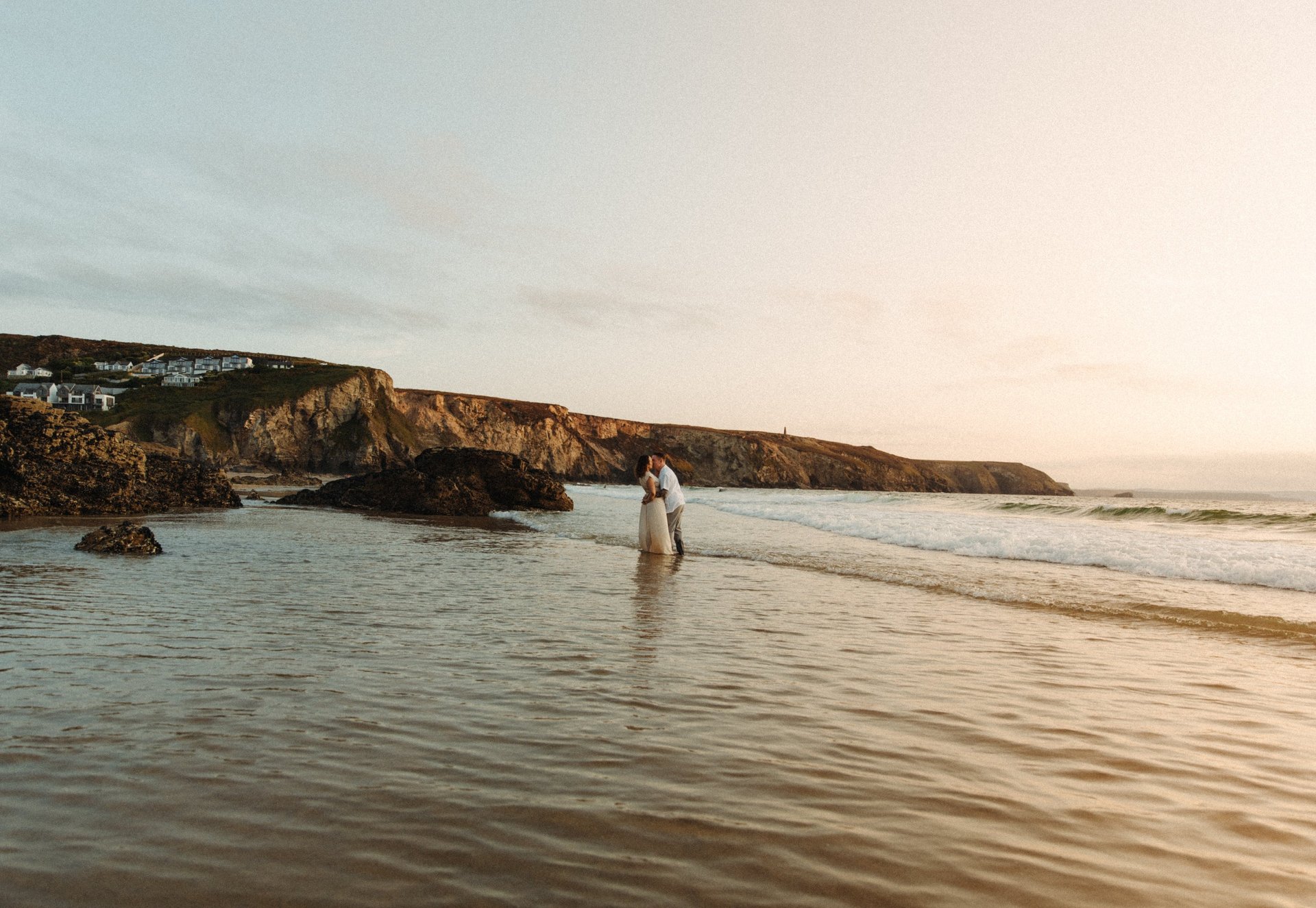 couple wearing silver-colored rings