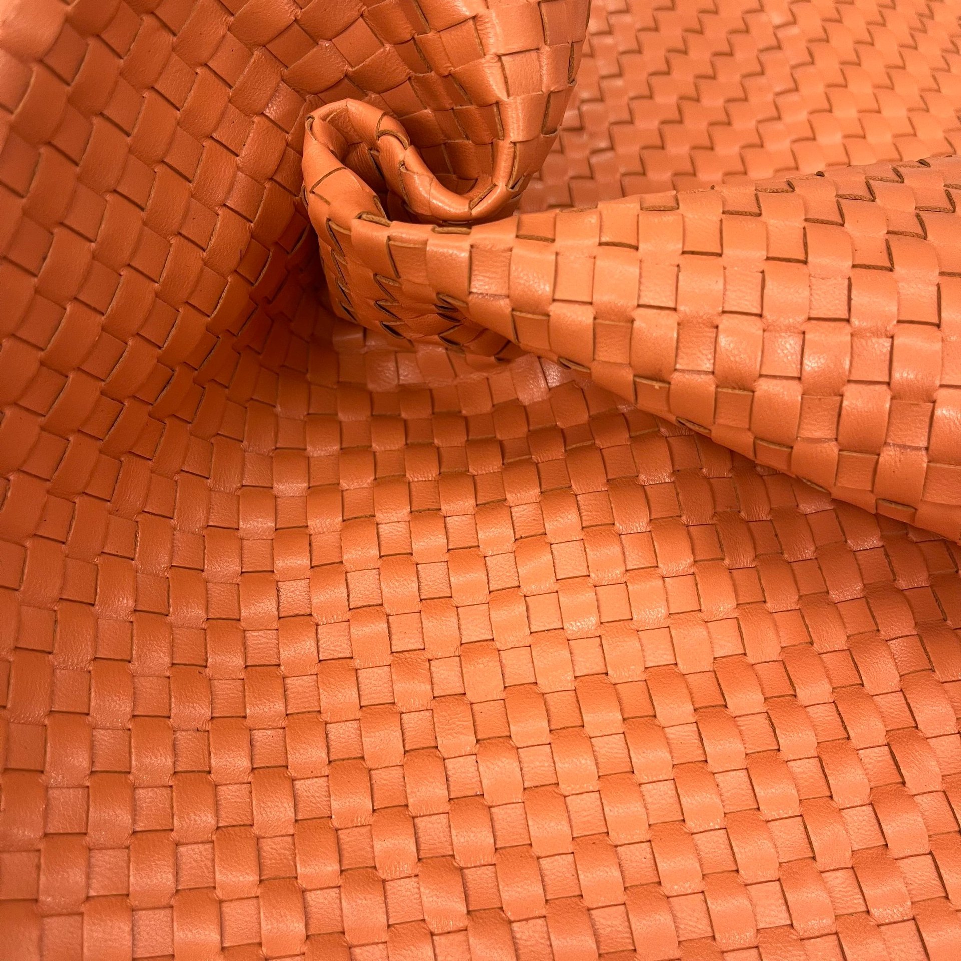 person wearing grey knit sweater