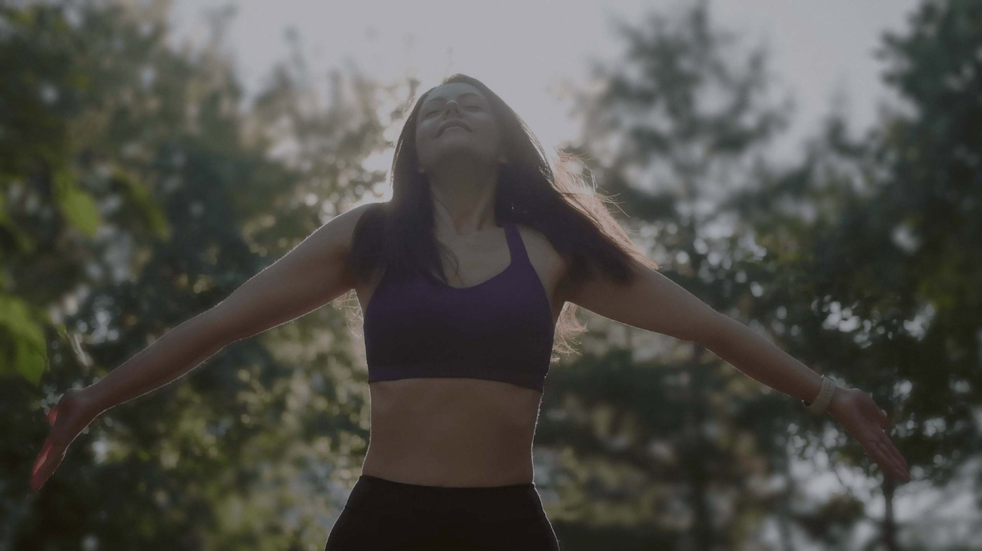 an abstract photo of a curved building with a blue sky in the background