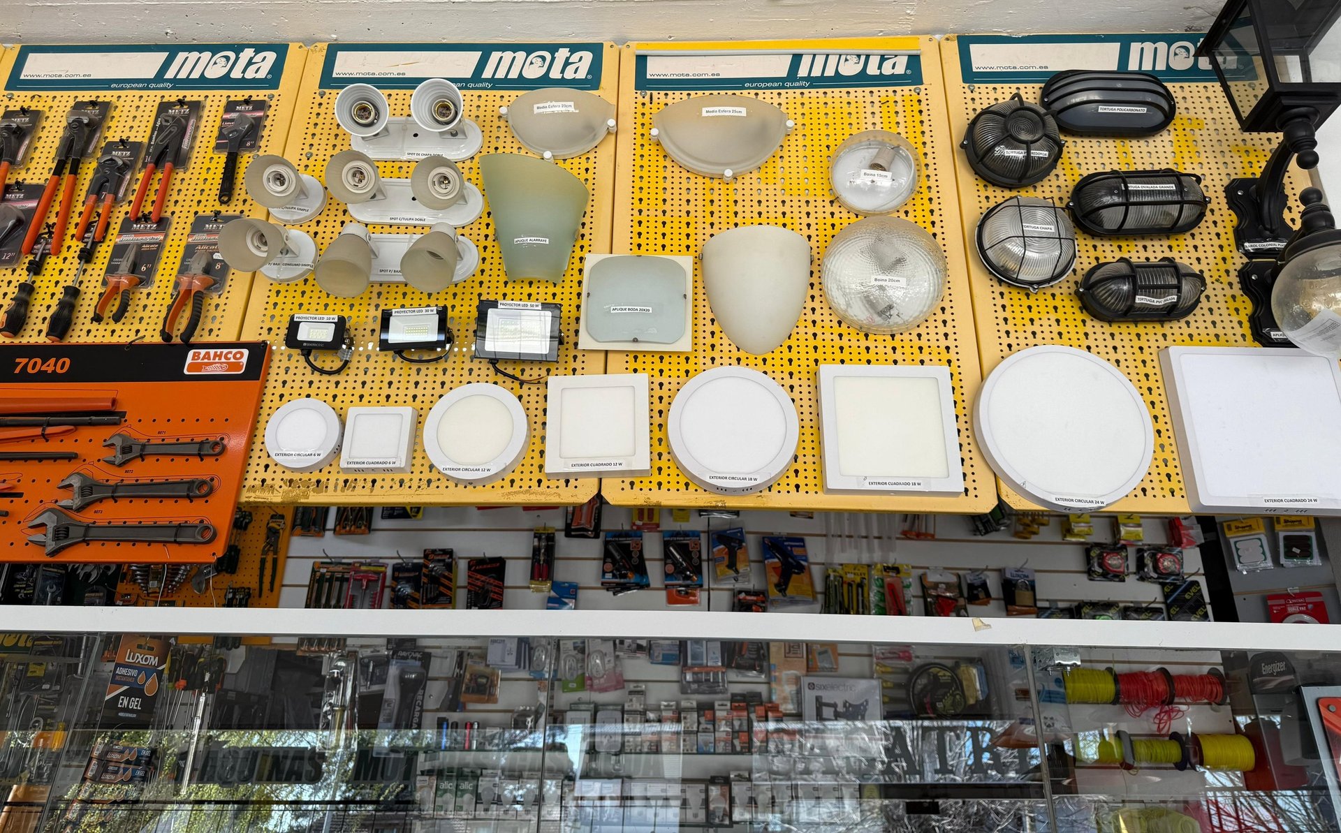 an abstract photo of a curved building with a blue sky in the background