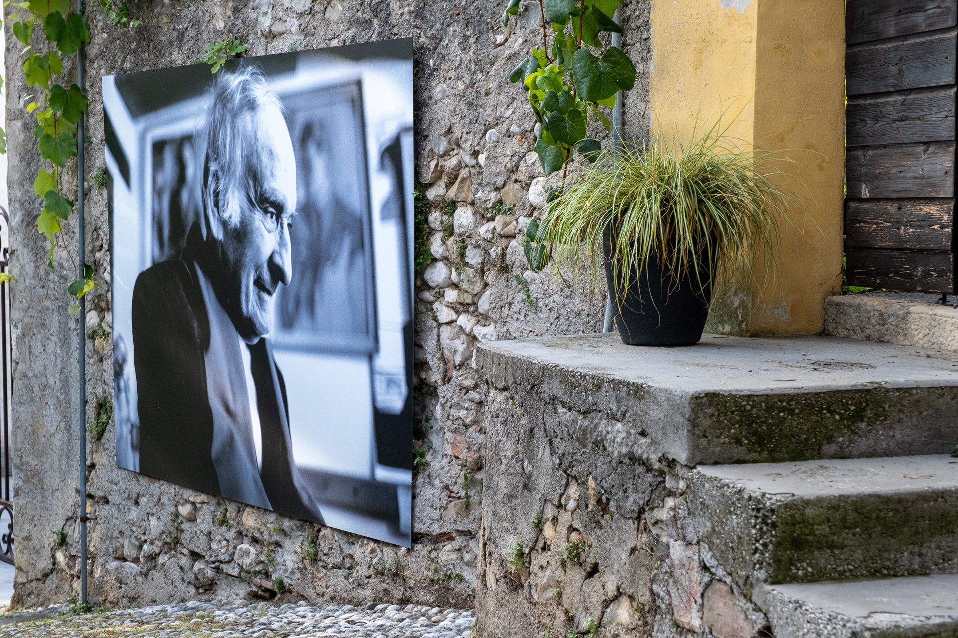 an abstract photo of a curved building with a blue sky in the background