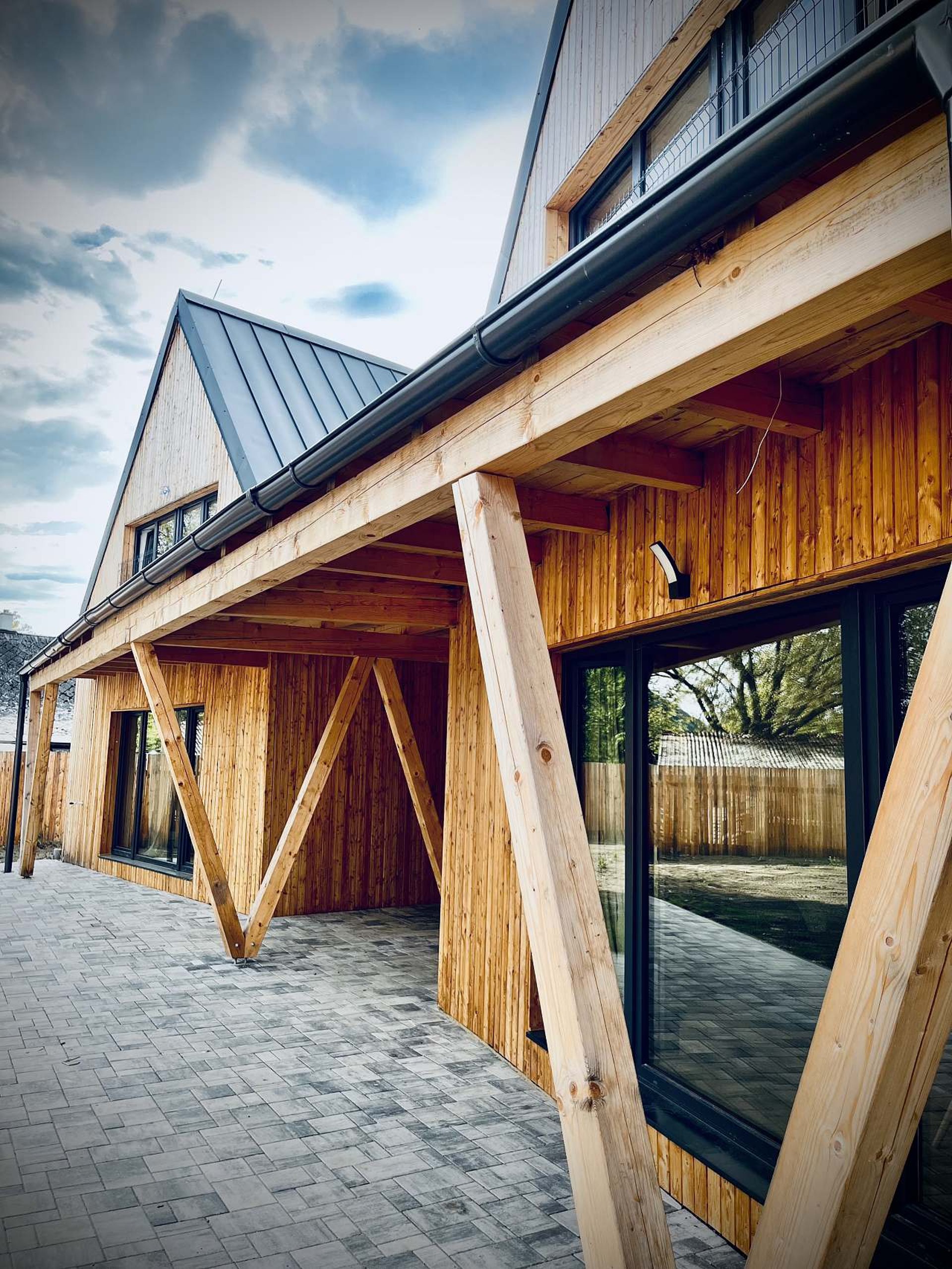 woman wearing yellow long-sleeved dress under white clouds and blue sky during daytime