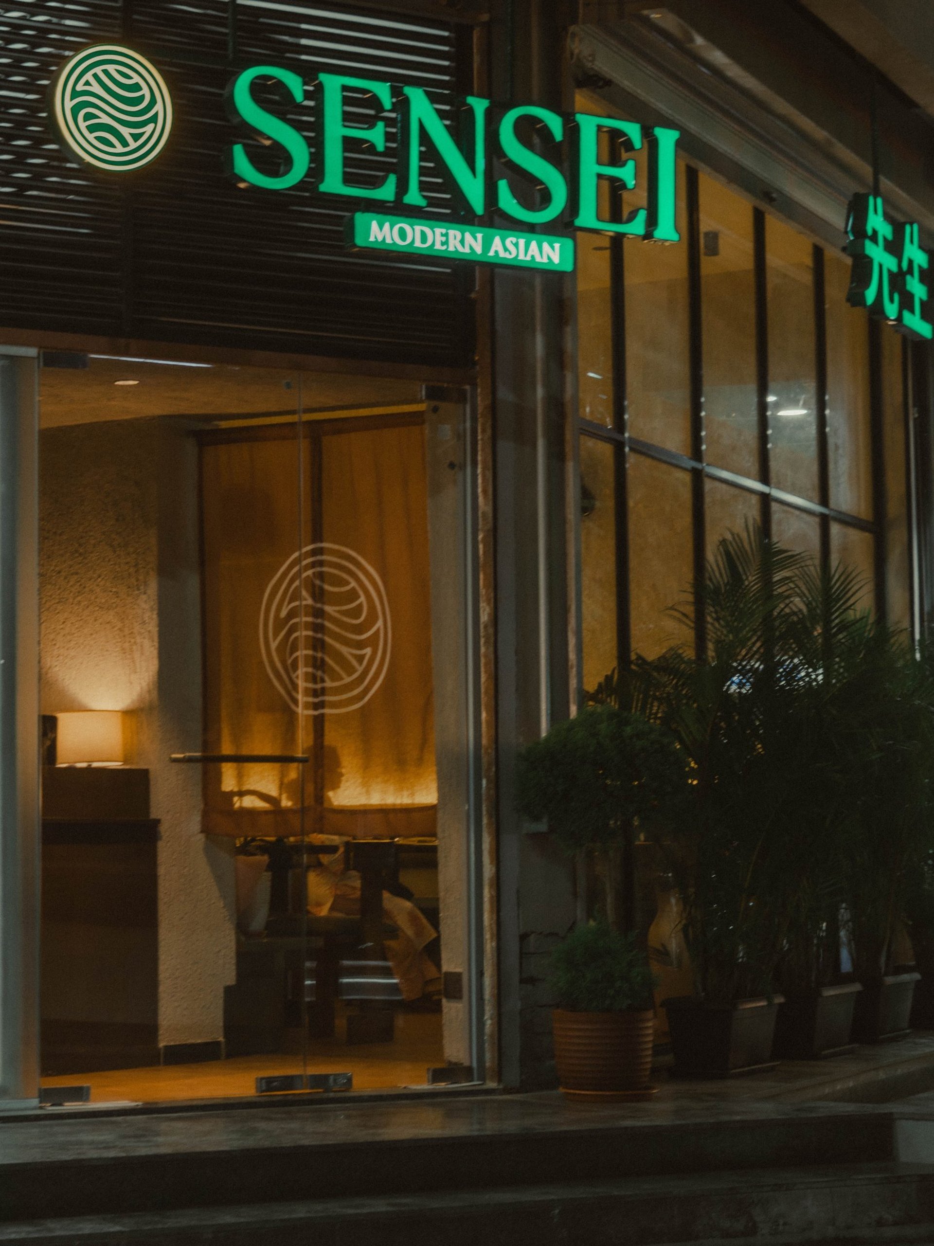 An upscale restaurant interior with dining tables.