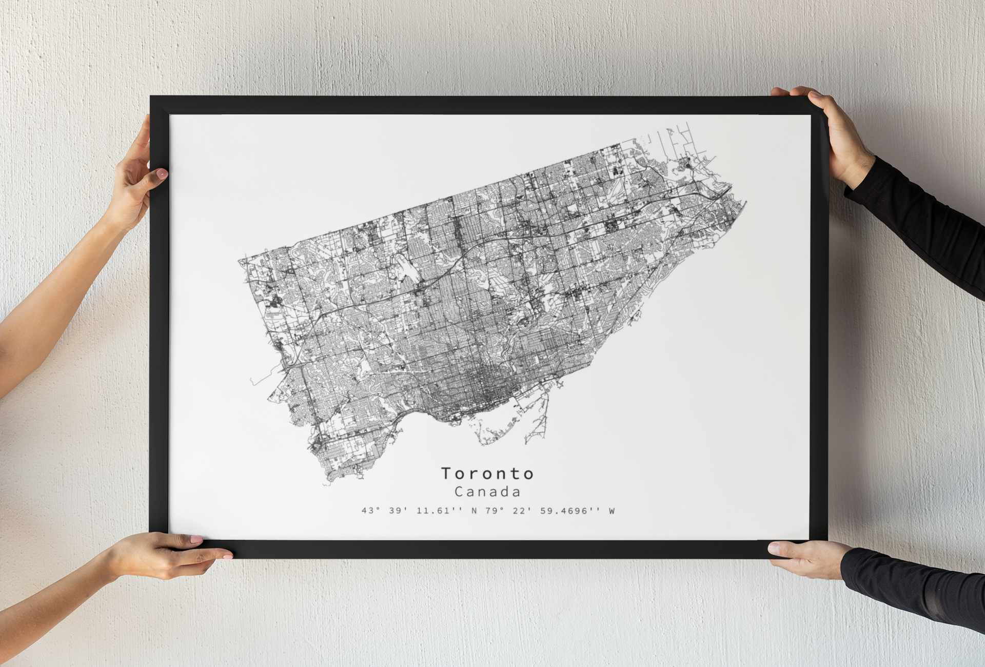 a wooden table topped with books and a pen