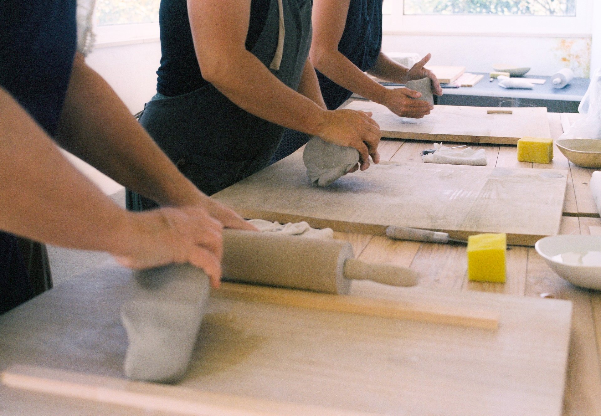 an abstract photo of a curved building with a blue sky in the background