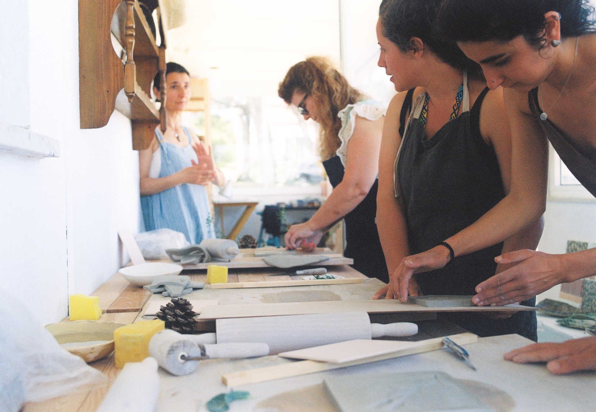 an abstract photo of a curved building with a blue sky in the background