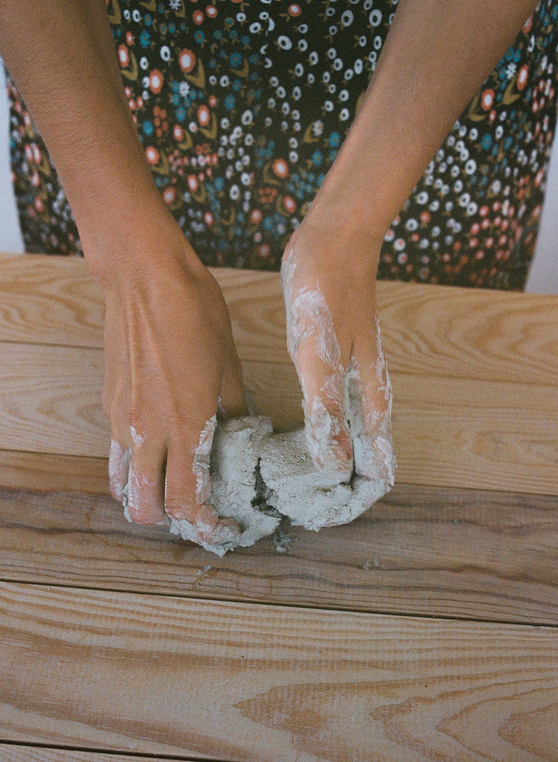 an abstract photo of a curved building with a blue sky in the background