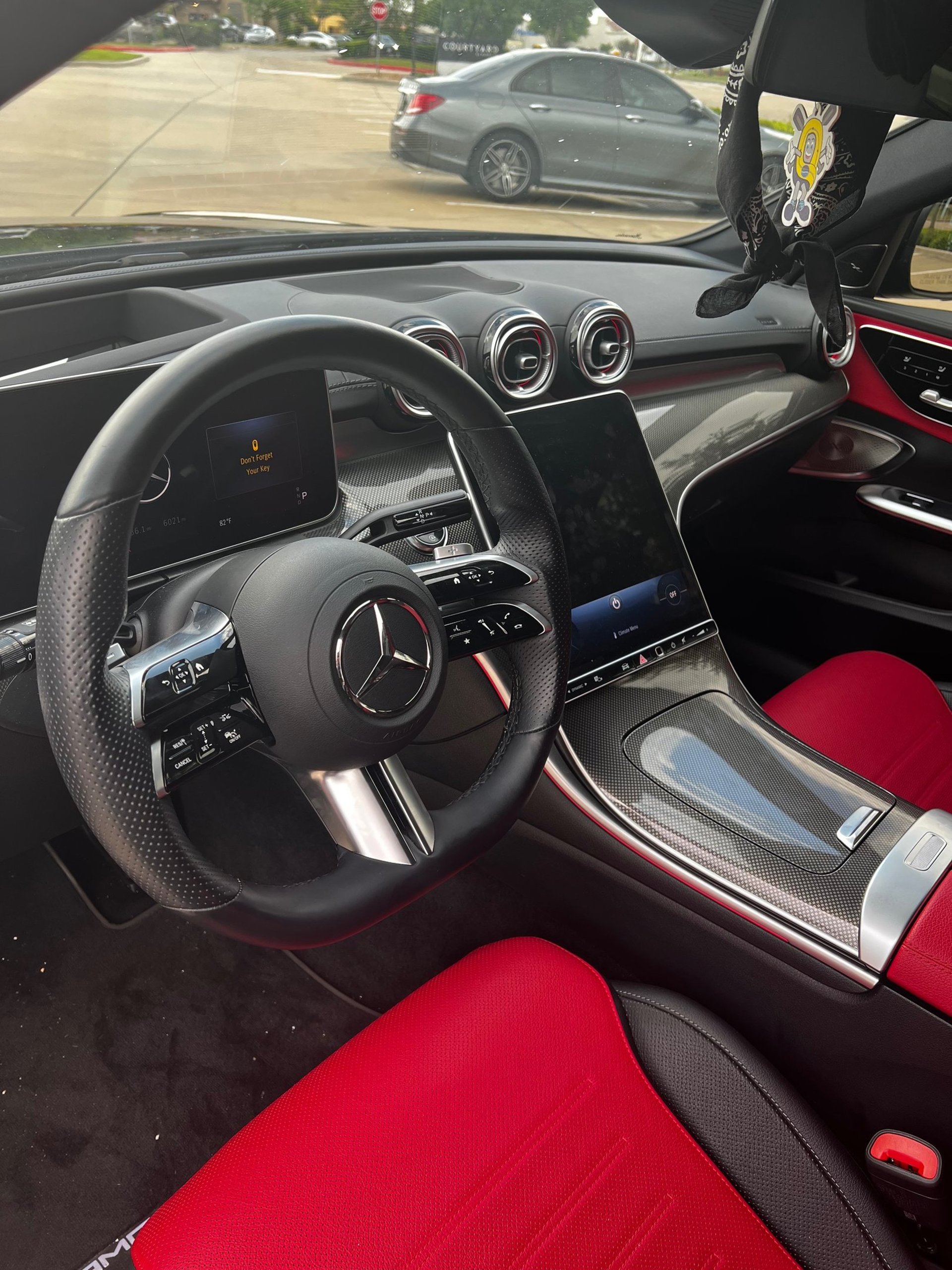 black and silver mercedes benz steering wheel