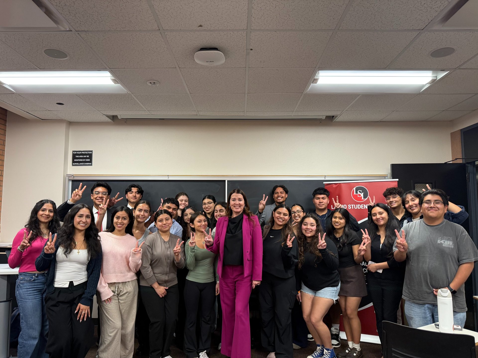 woman wearing yellow long-sleeved dress under white clouds and blue sky during daytime