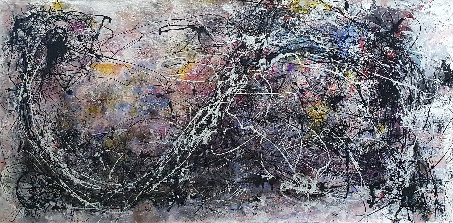 an abstract photo of a curved building with a blue sky in the background