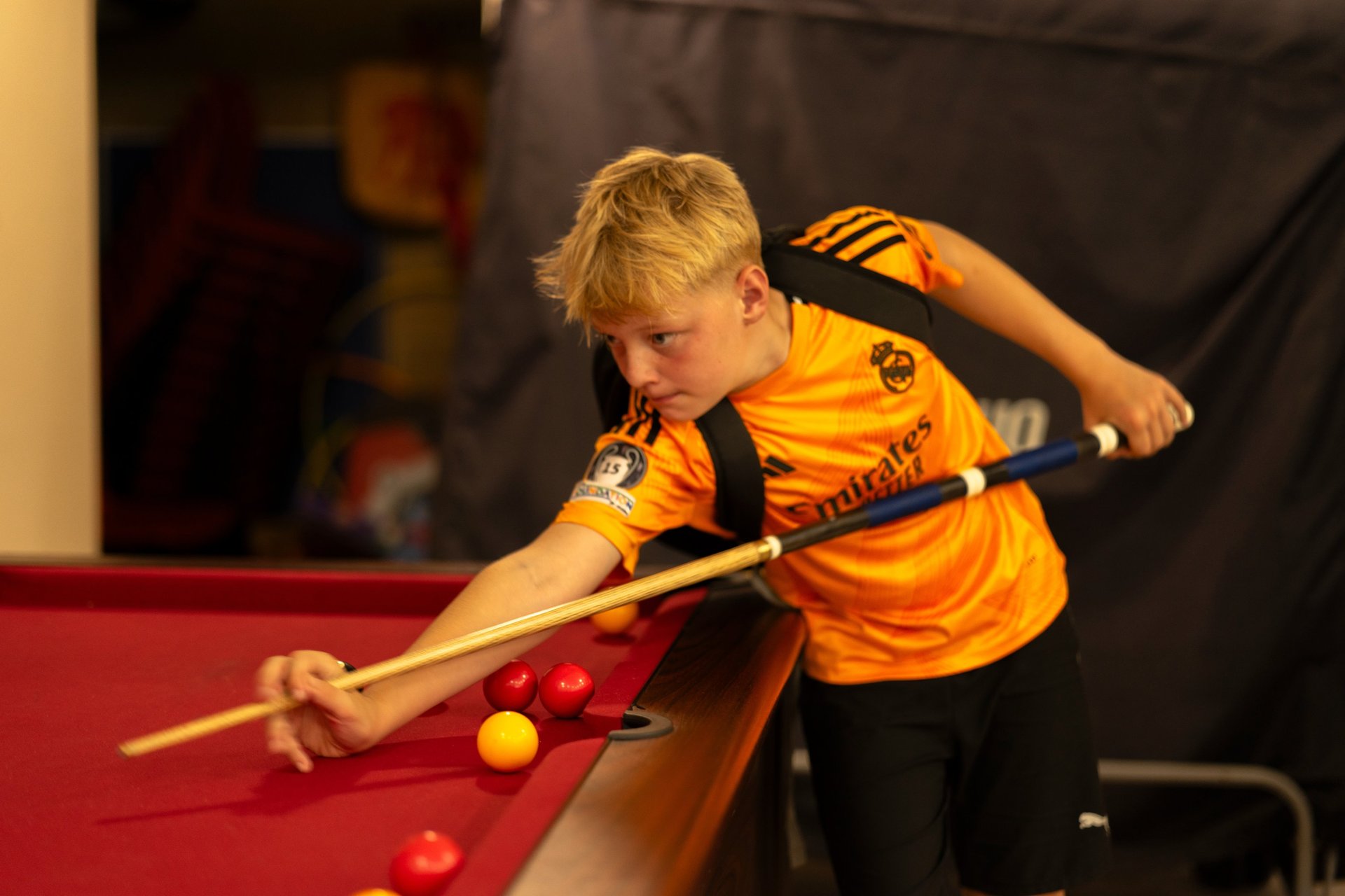 woman wearing yellow long-sleeved dress under white clouds and blue sky during daytime