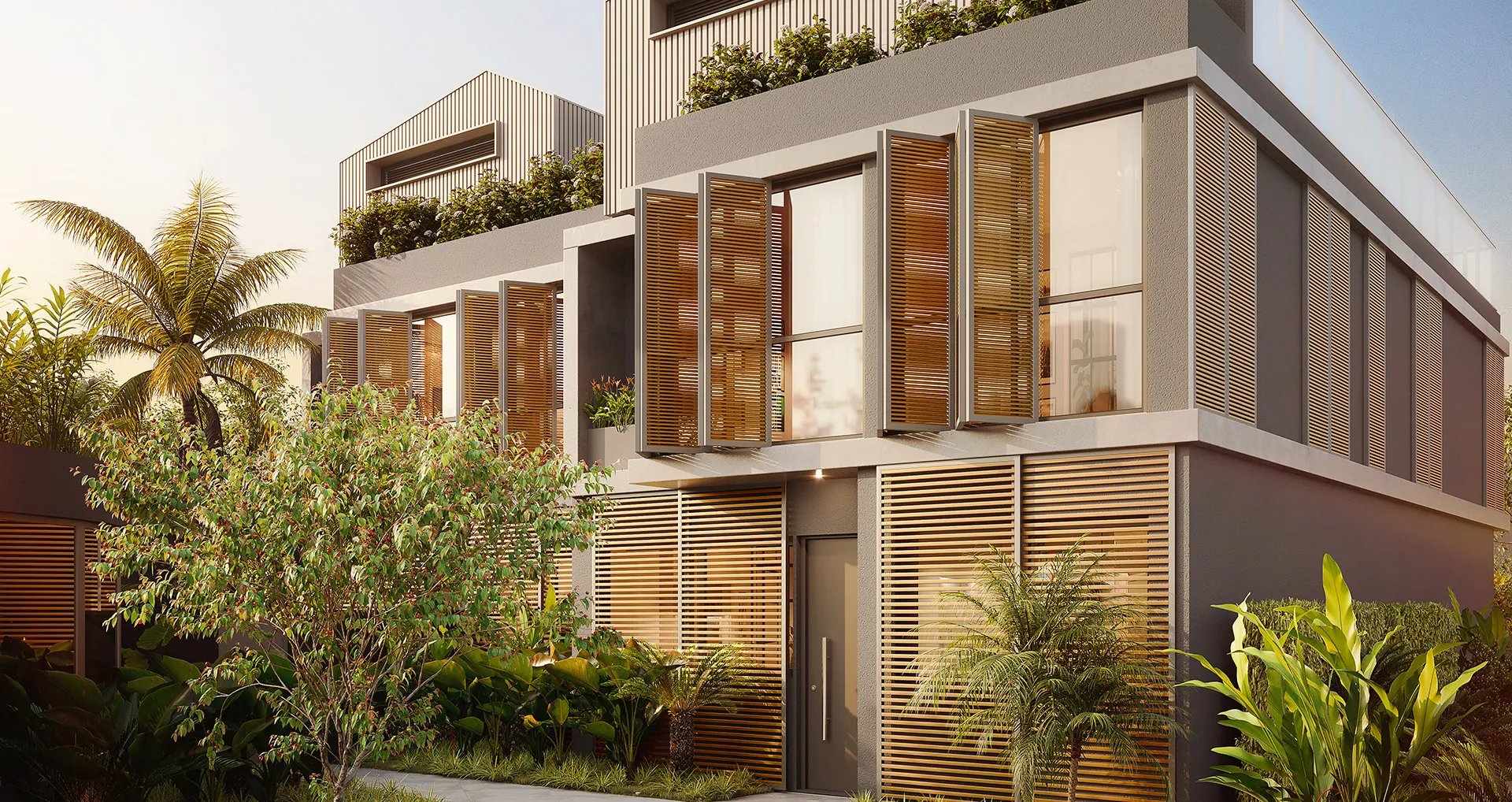 a woman sitting at a table writing on a piece of paper