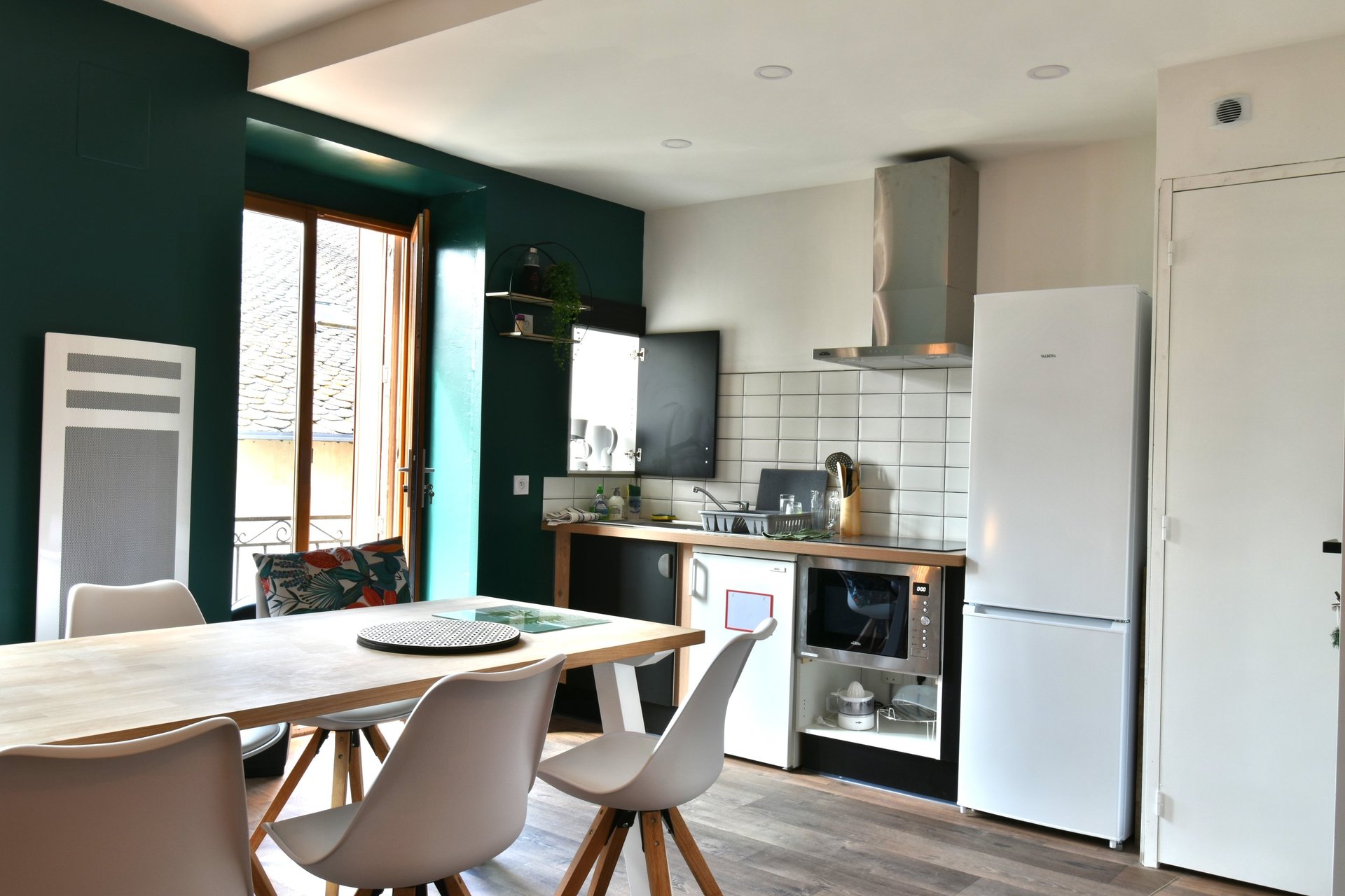 turned on pendant lamps above kitchen island