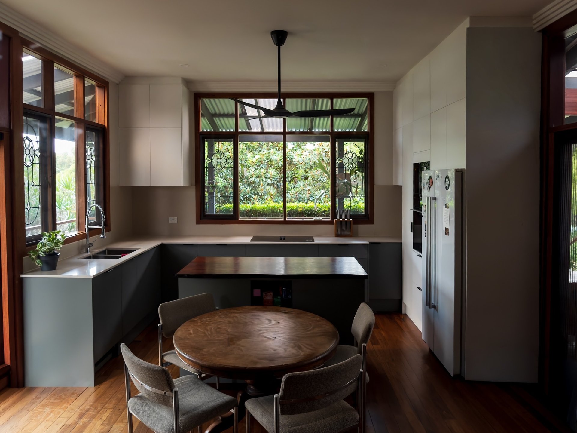 white wooden kitchen cabinet over white kitchen counter