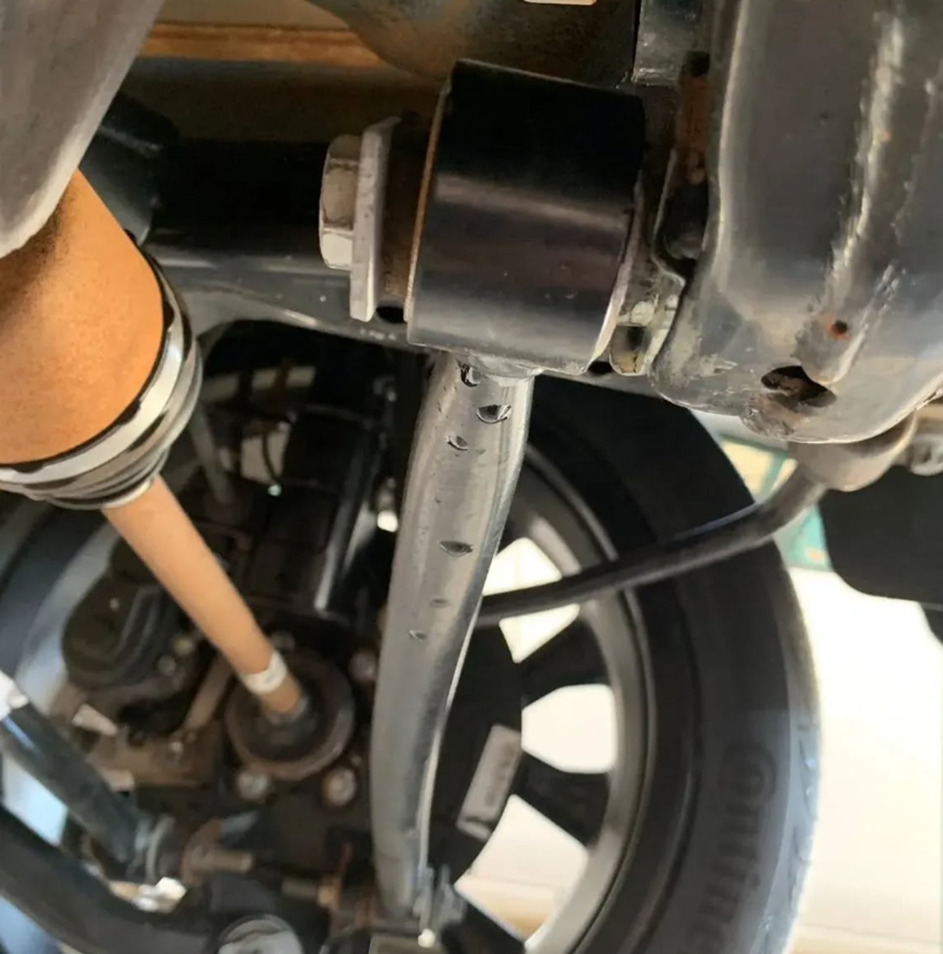 an abstract photo of a curved building with a blue sky in the background