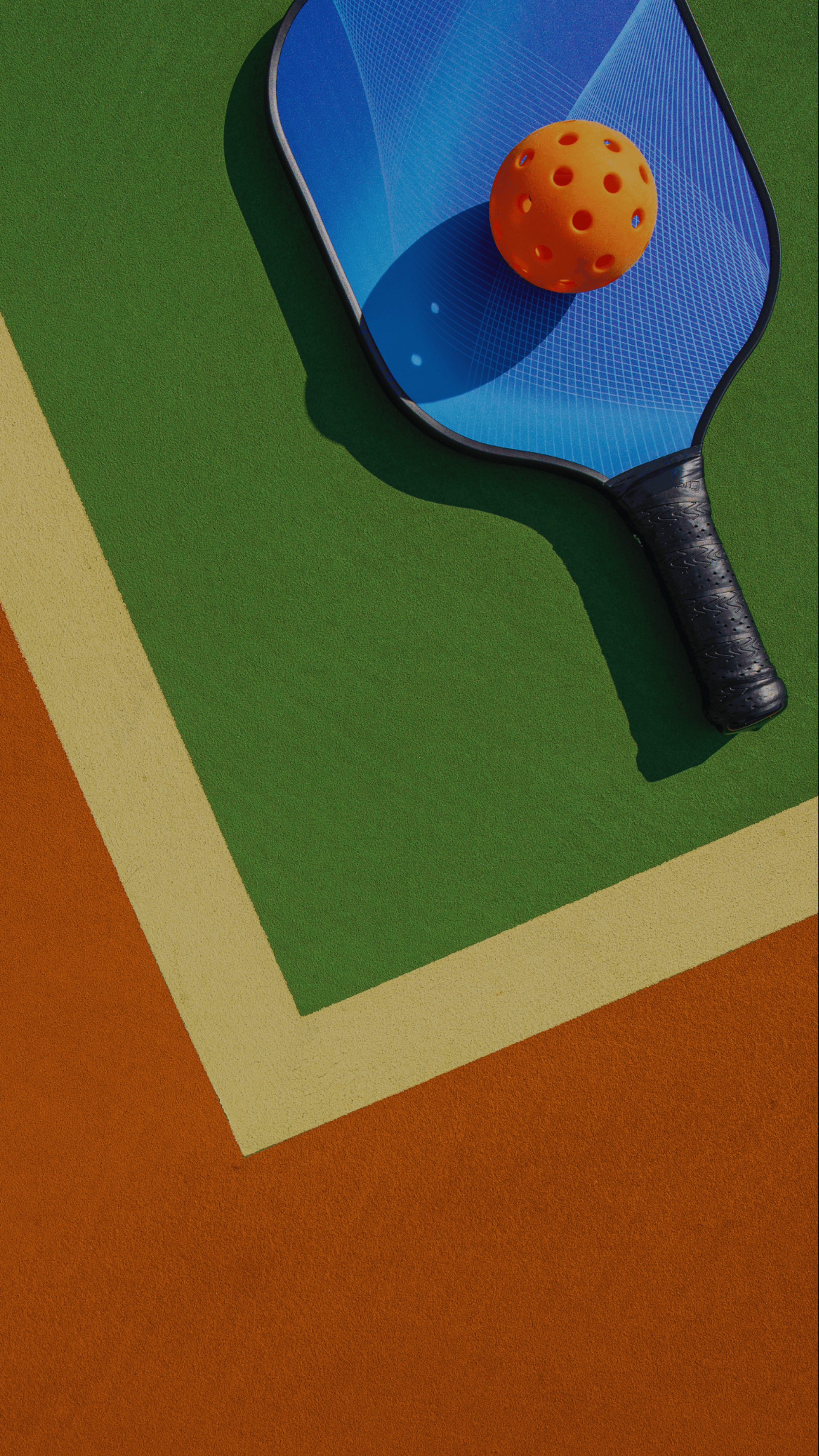 a tennis racket and ball on a court