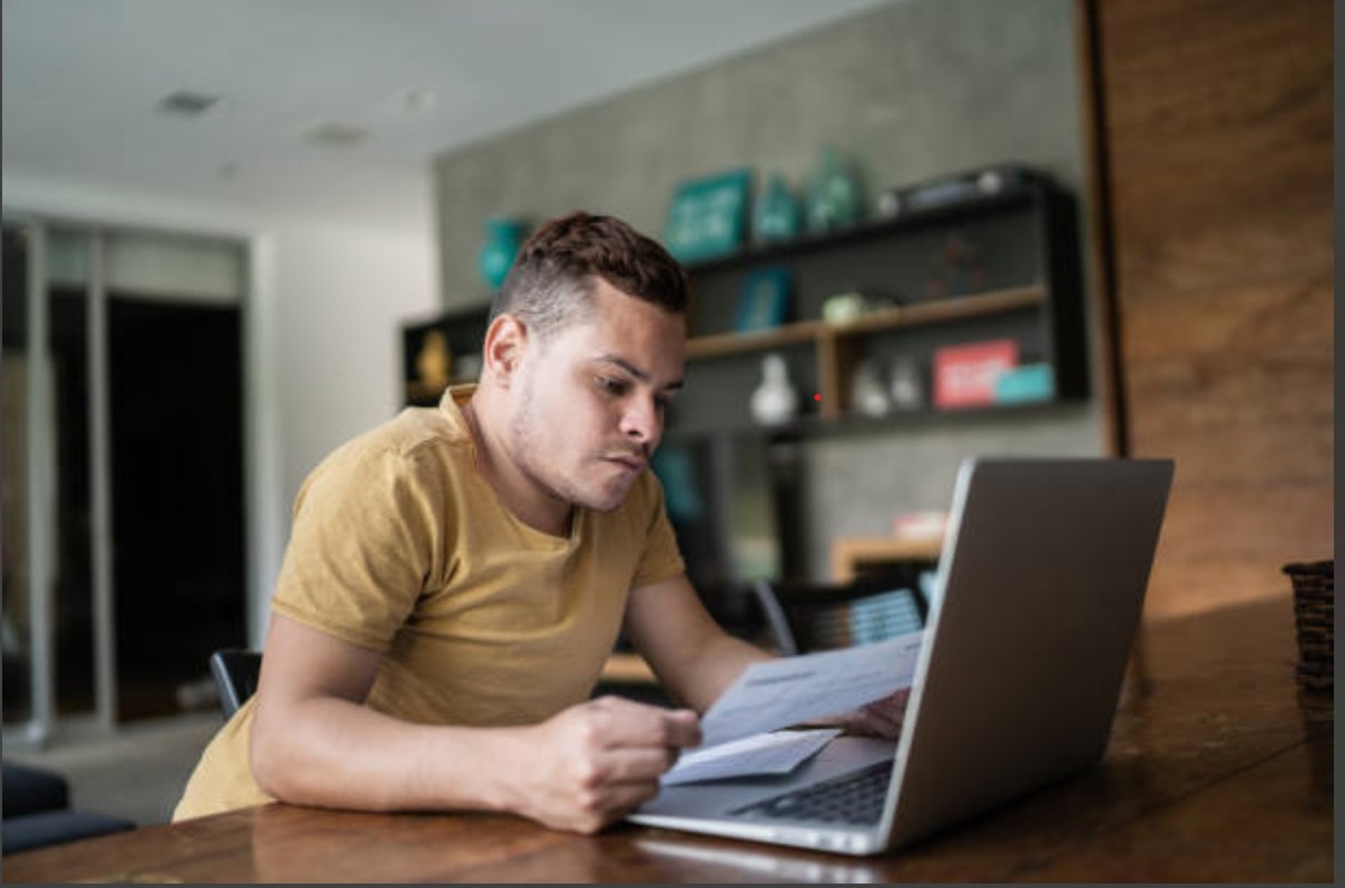 MacBook Pro near white open book