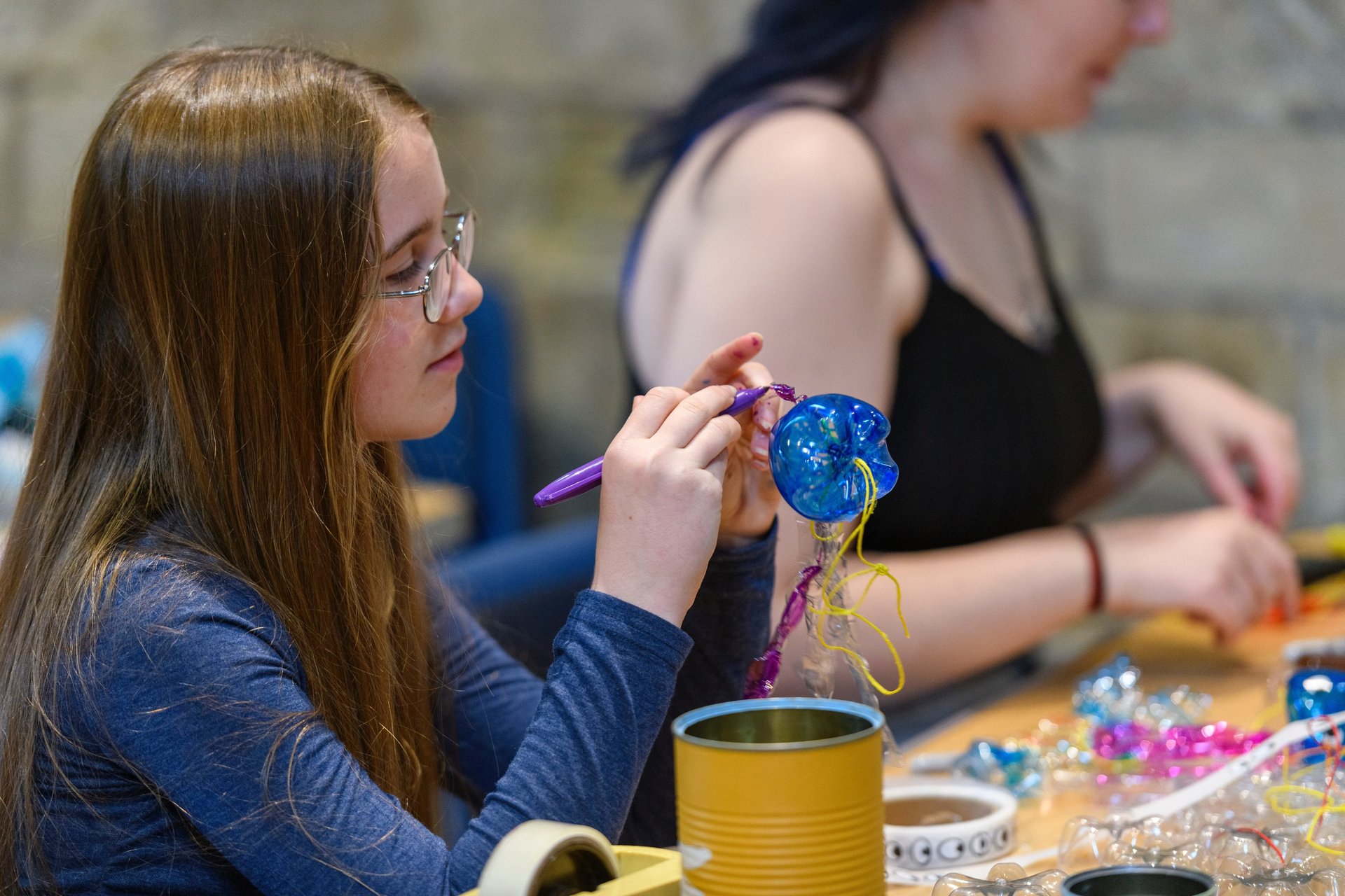 an abstract photo of a curved building with a blue sky in the background