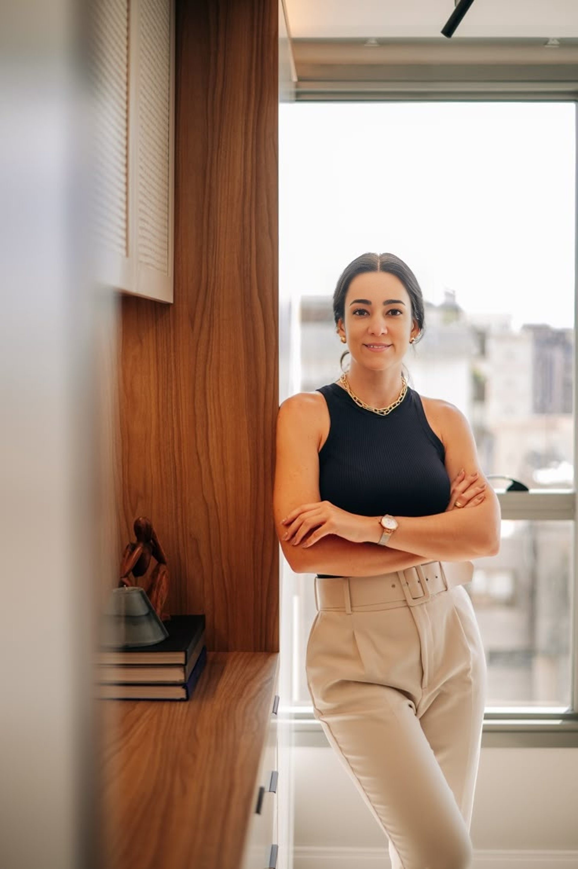 black and brown leather padded tub sofa