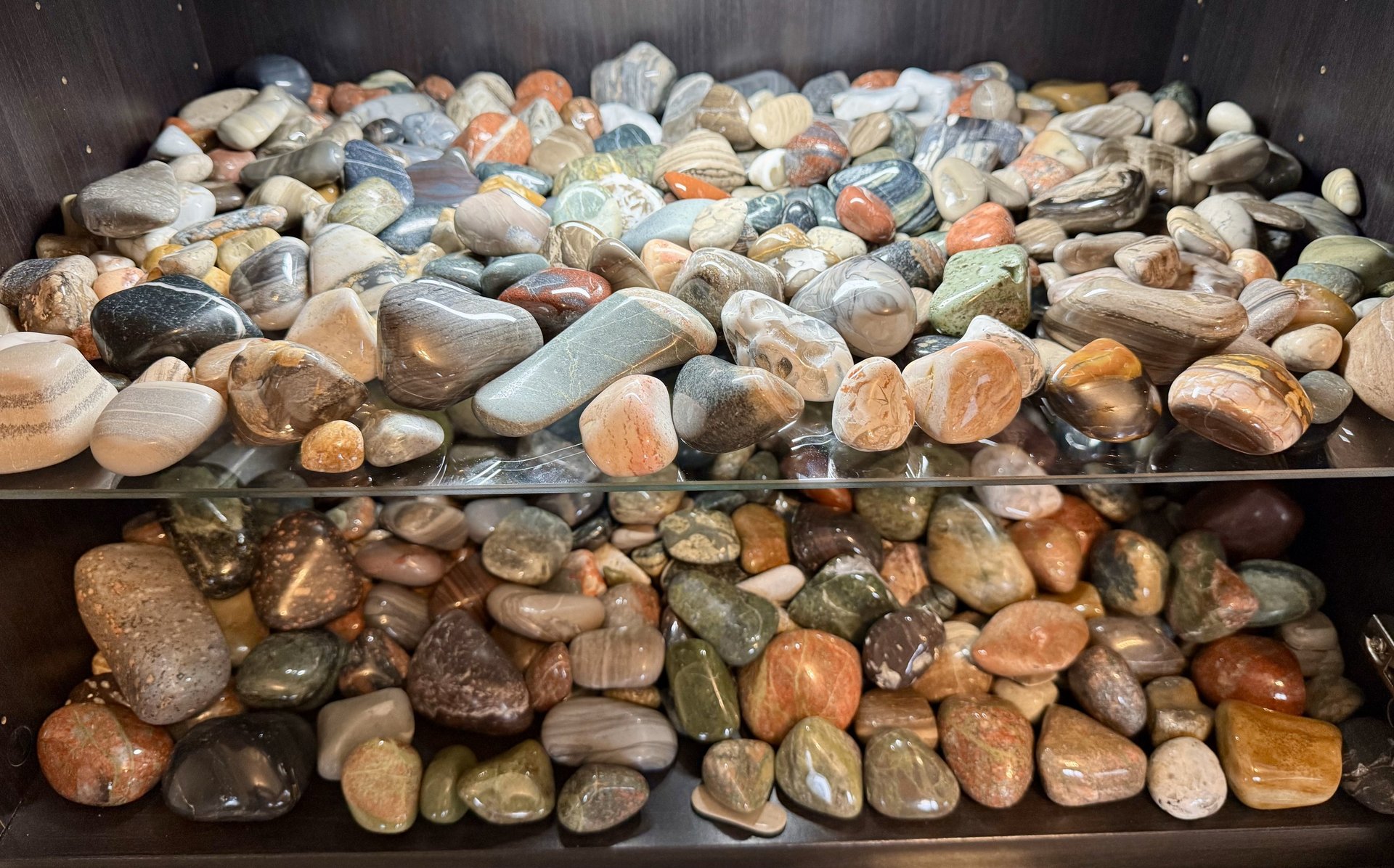 person wearing grey knit sweater