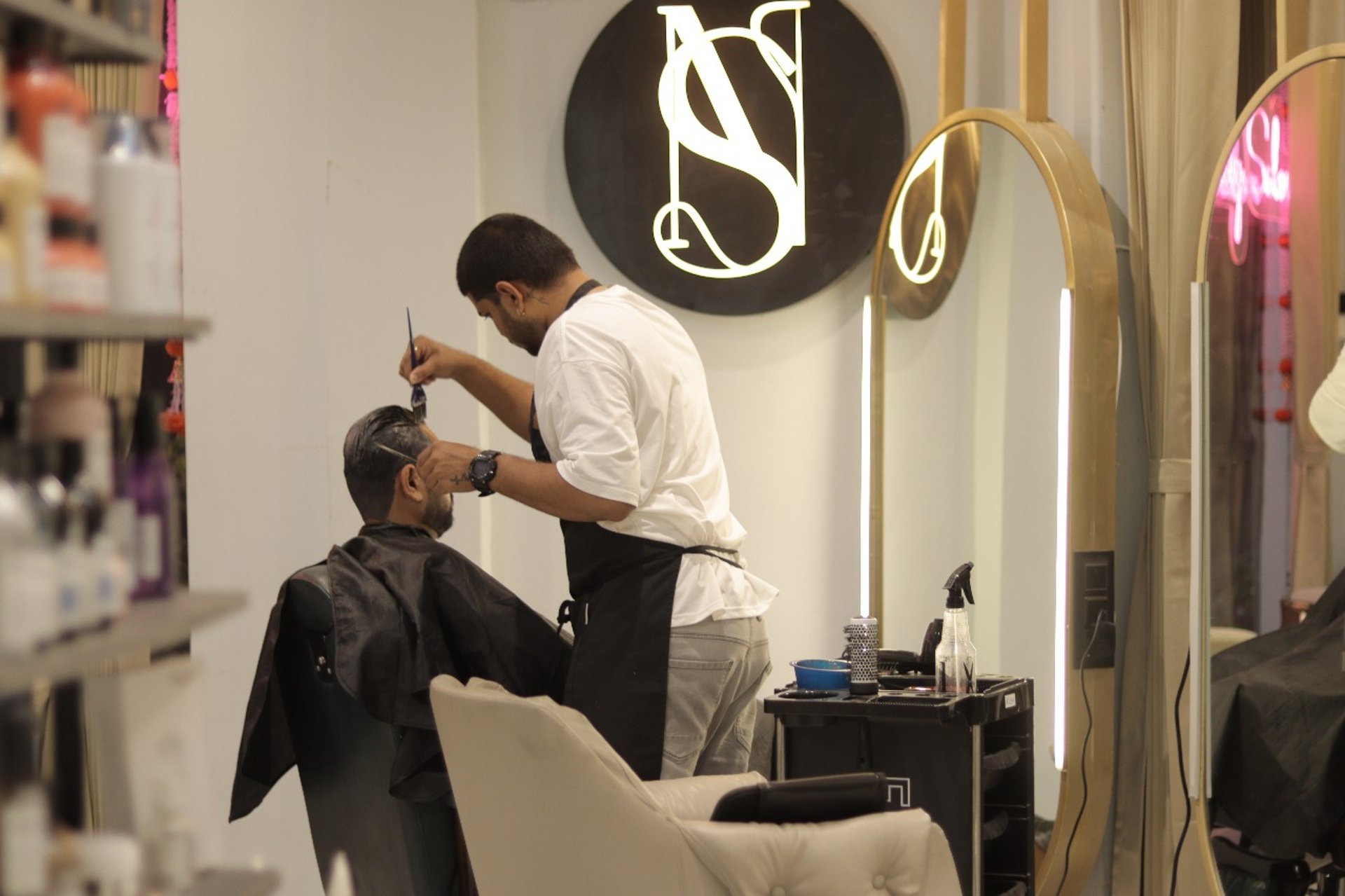an abstract photo of a curved building with a blue sky in the background