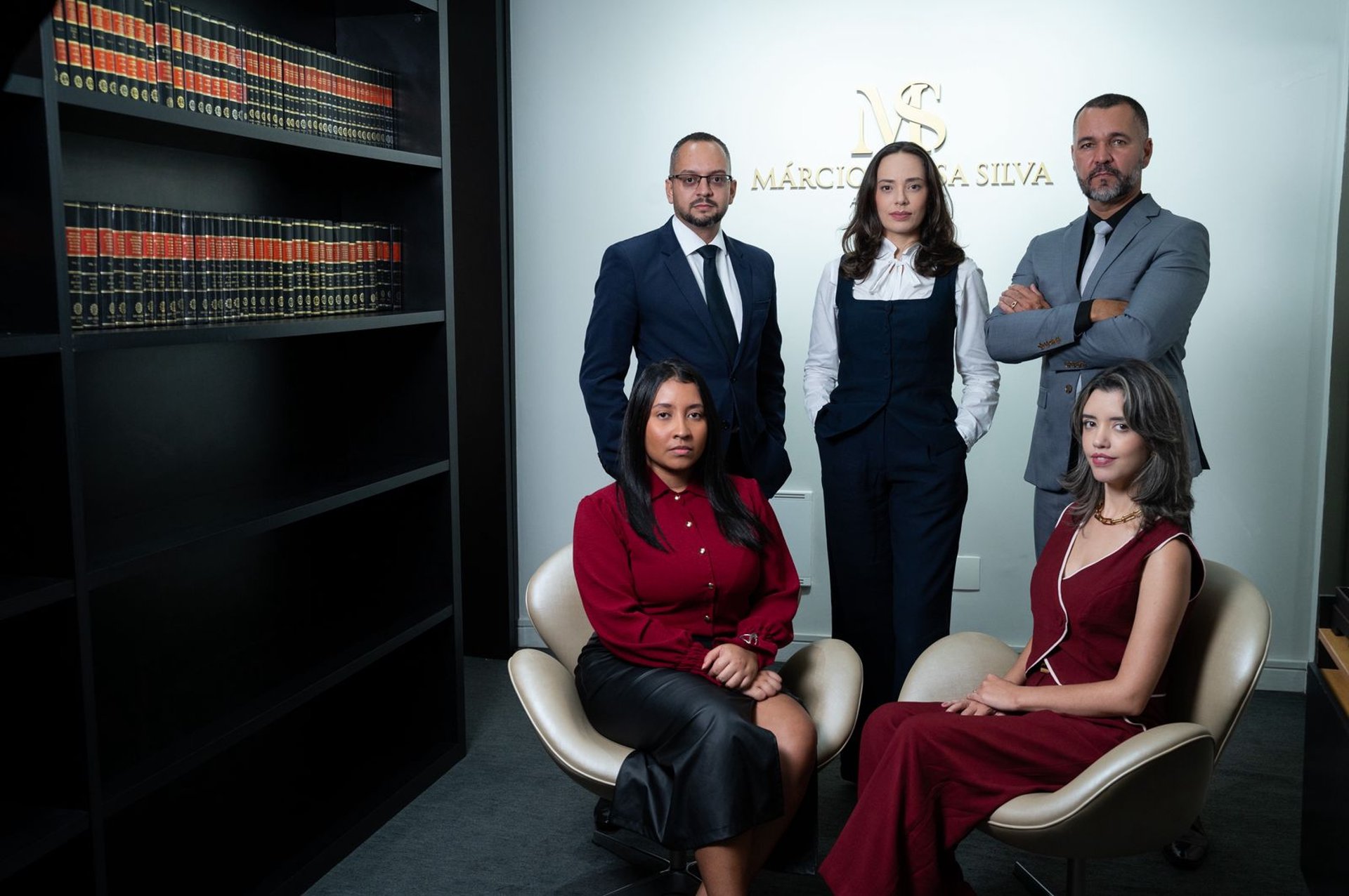 black and brown leather padded tub sofa