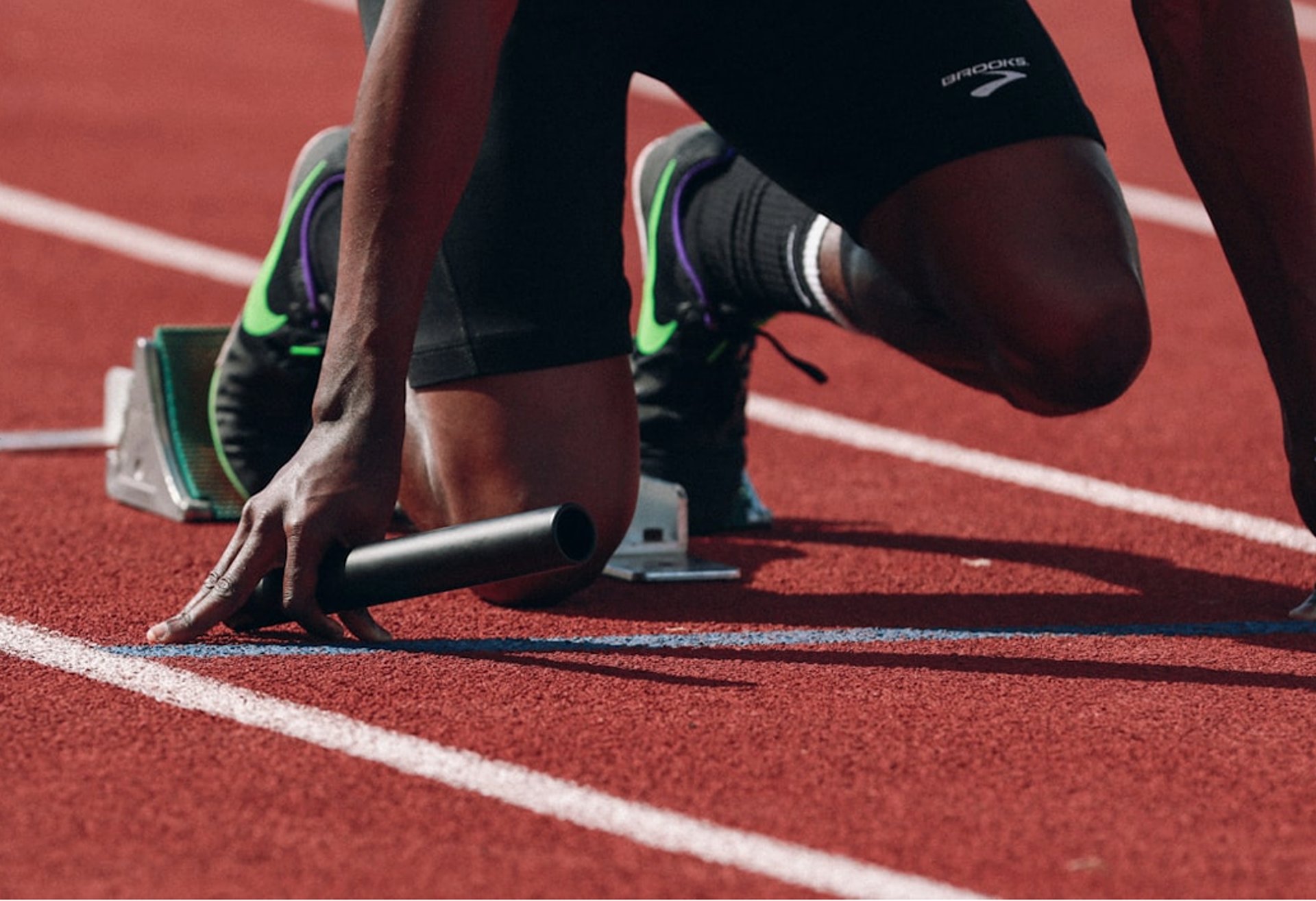man on running field