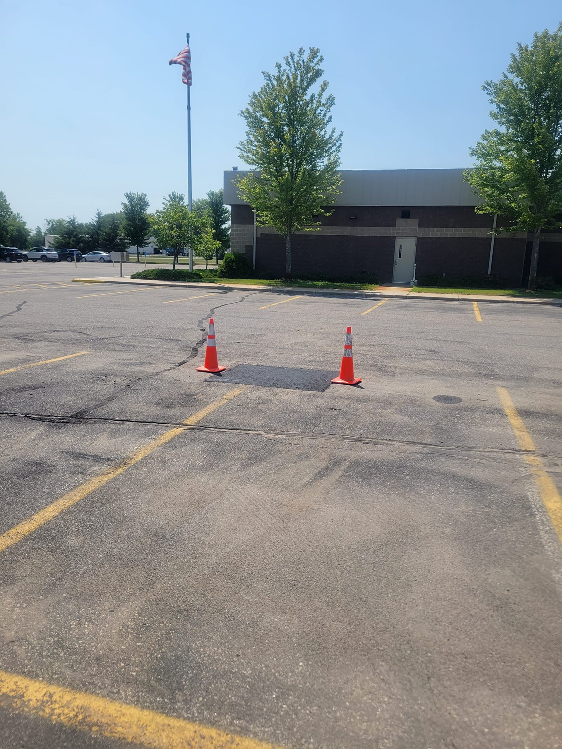 asphalt-repair-in-a-parking-lot.jpg