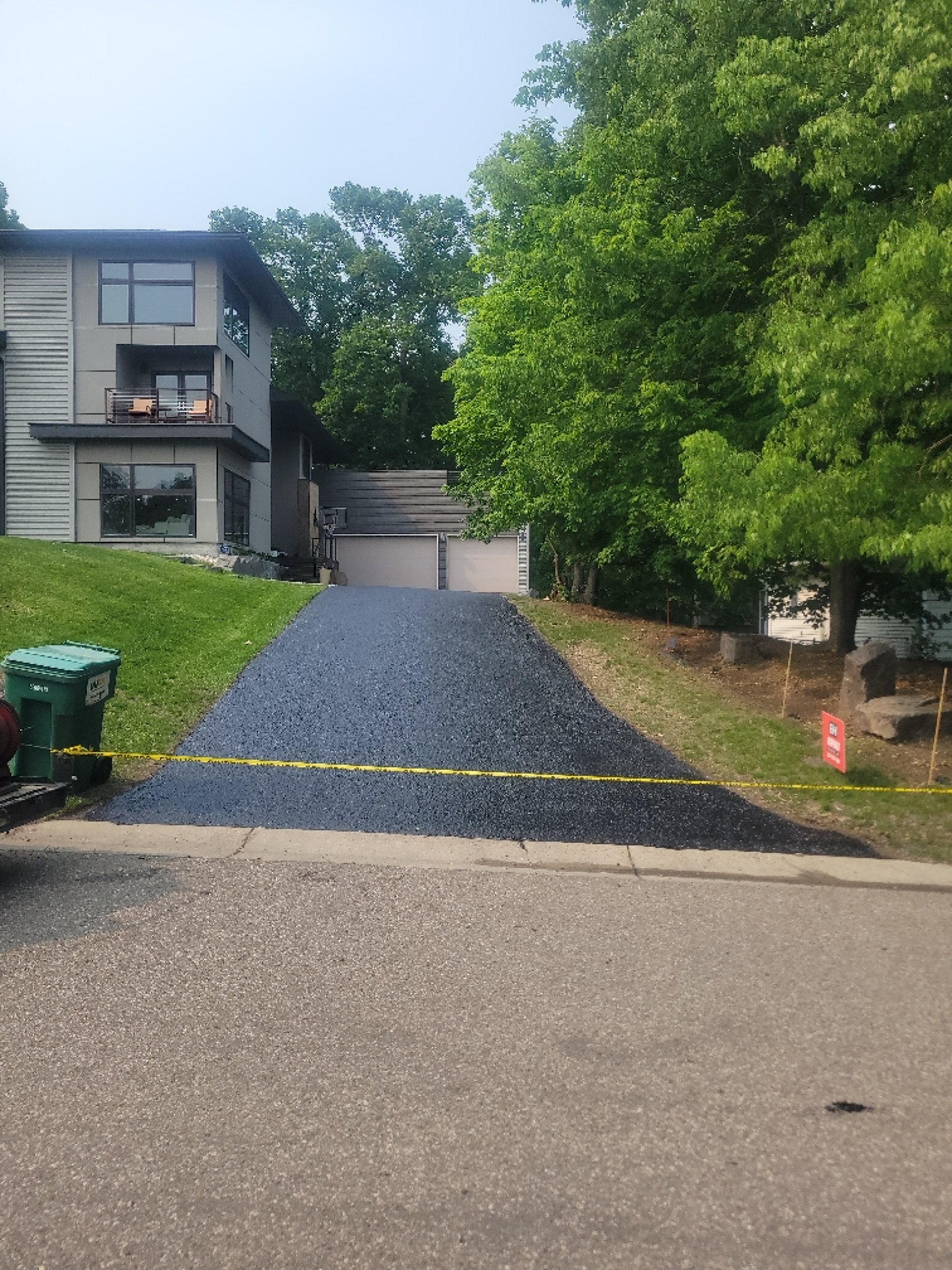 seal-coating-on-modern-home-driveway.jpg