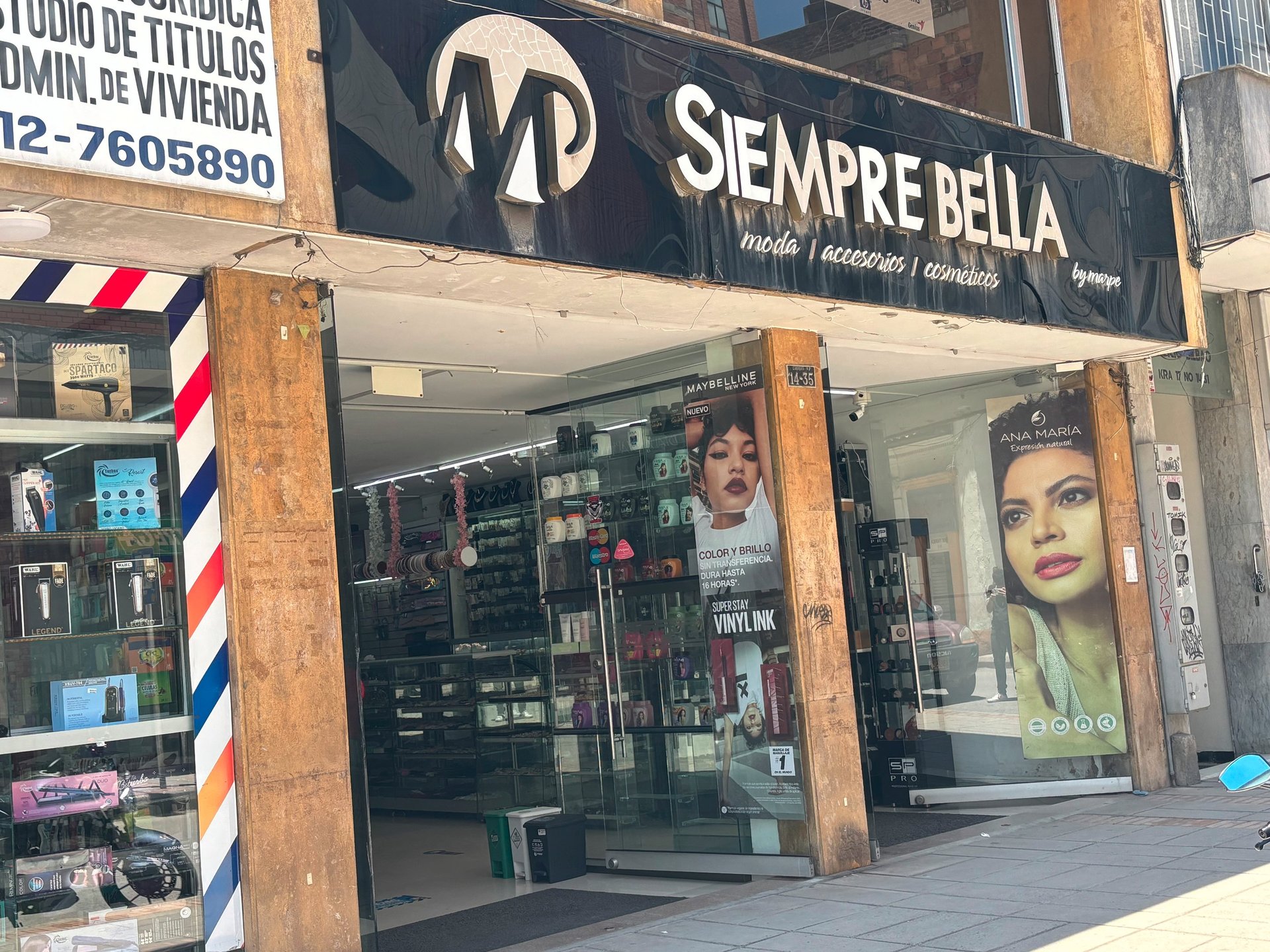 an abstract photo of a curved building with a blue sky in the background