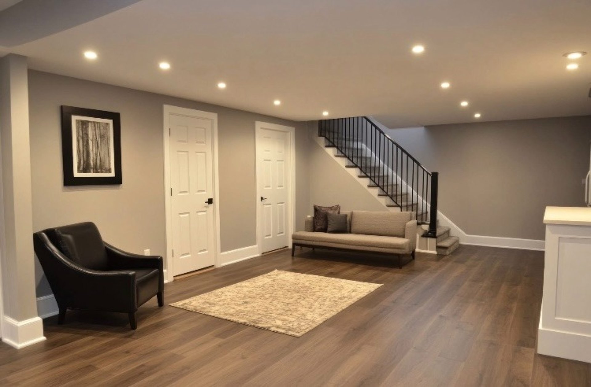 a porch with two chairs and a table on it