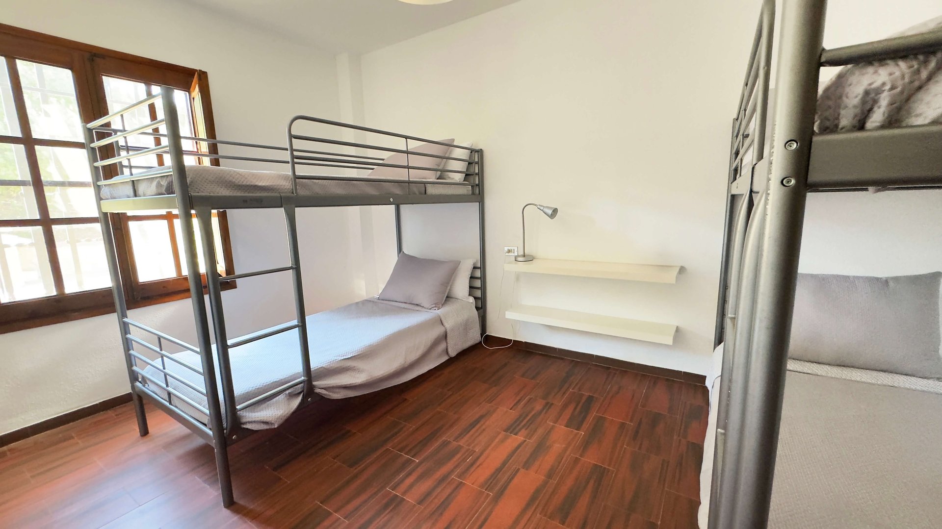 an abstract photo of a curved building with a blue sky in the background