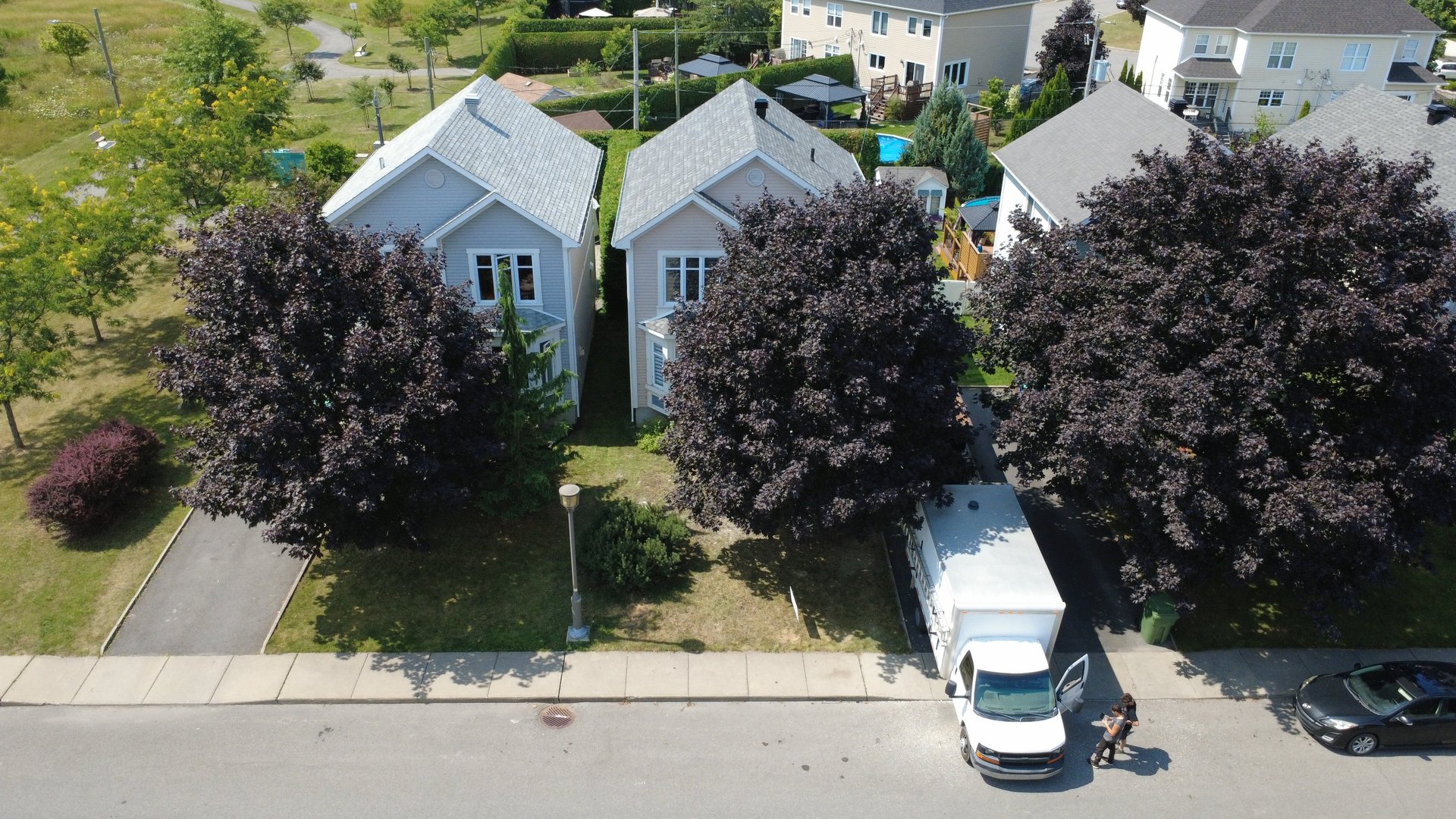 black and brown leather padded tub sofa