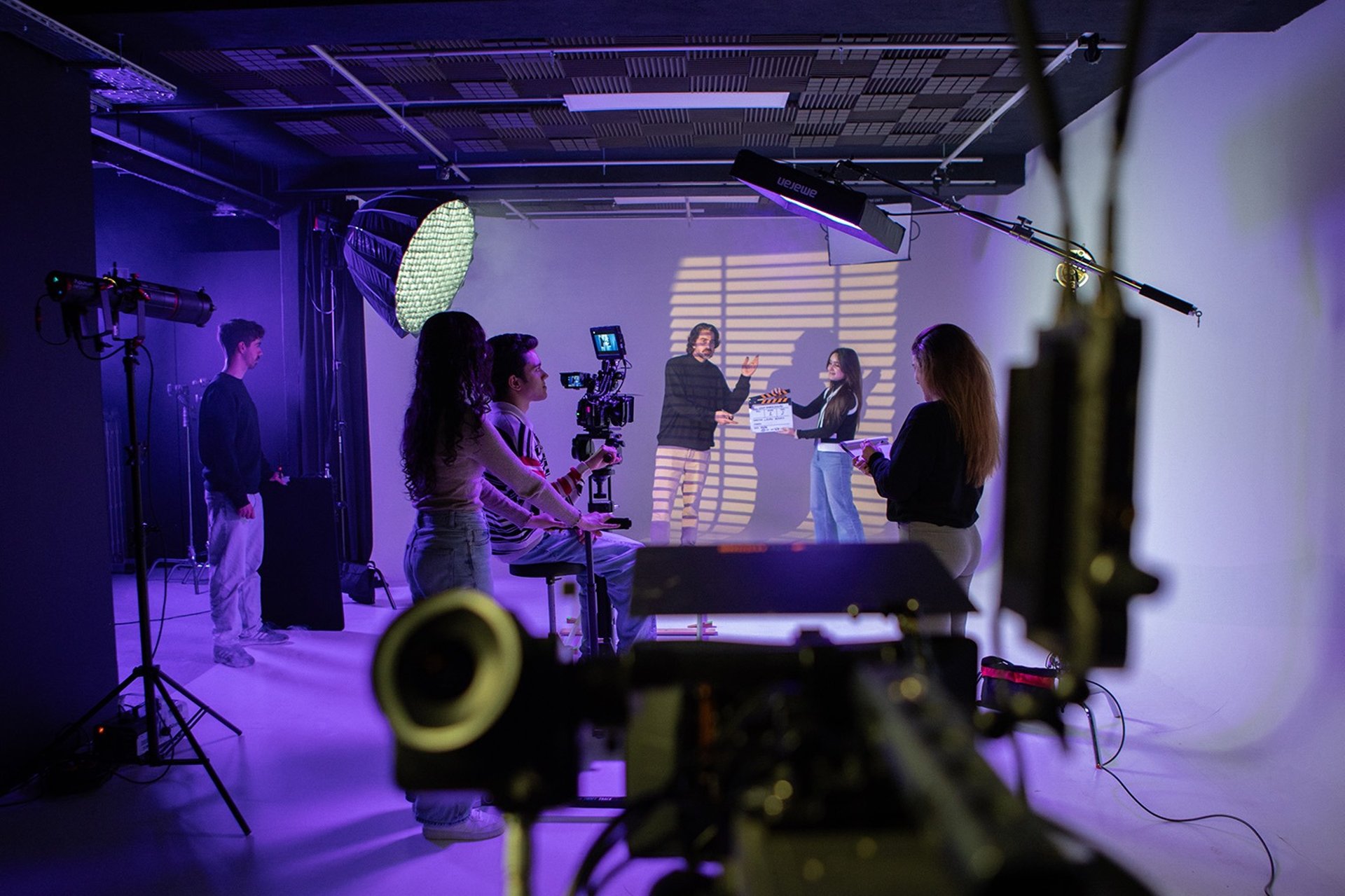 silhouette photography of man holding camera